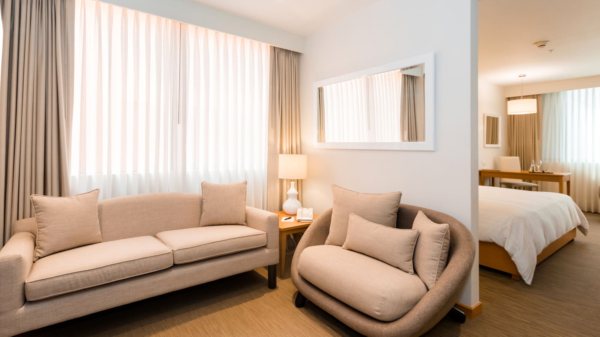 a room with a couch and a bed