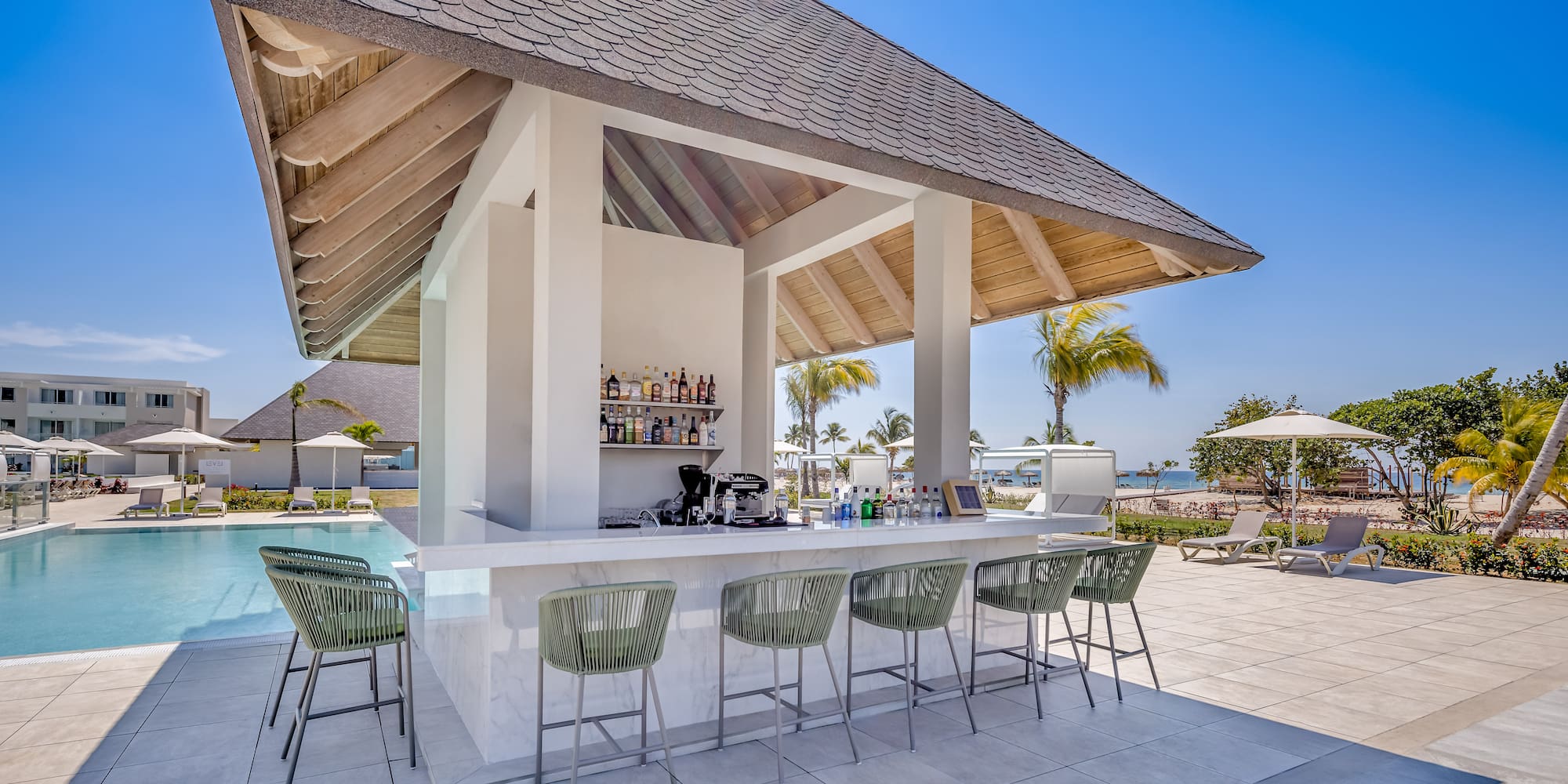 a bar with chairs around it