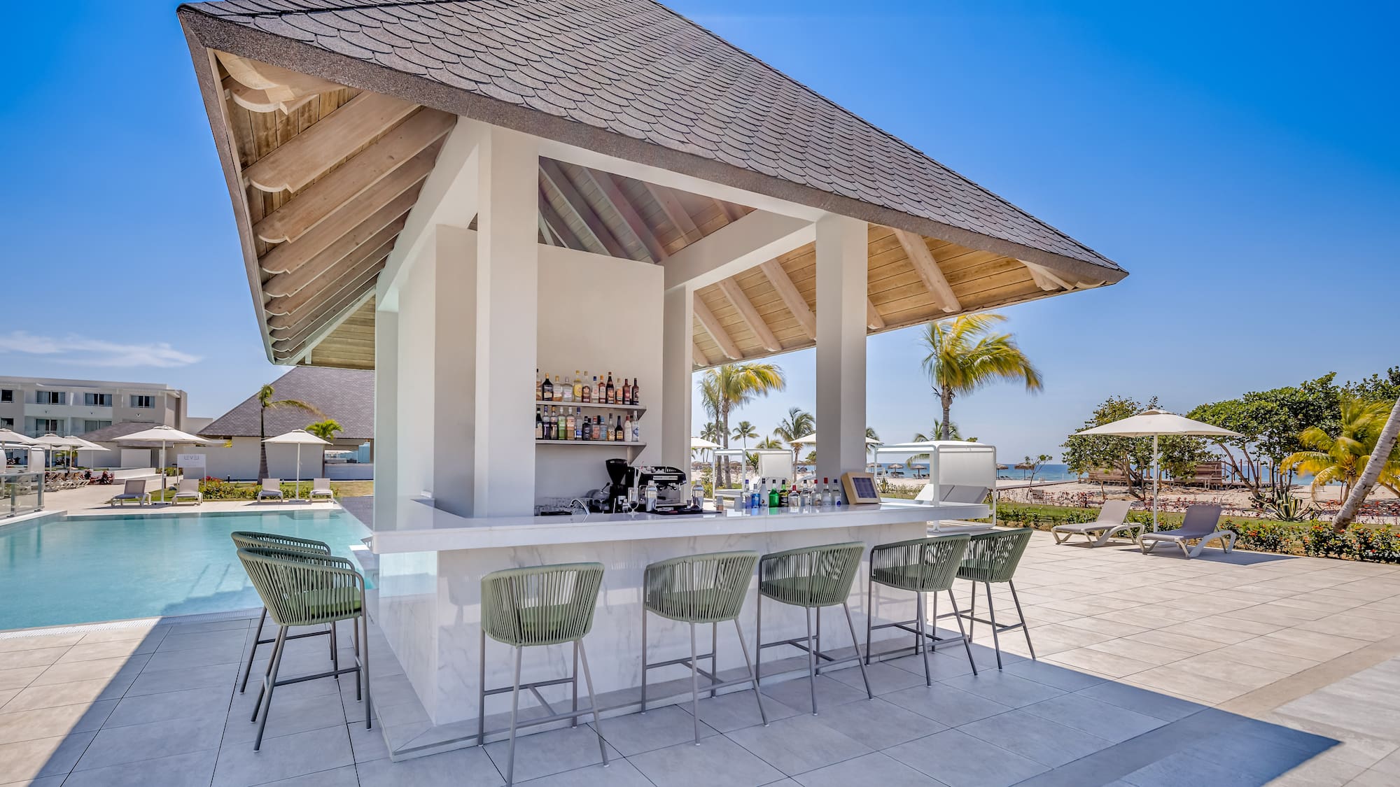 a bar with chairs around it