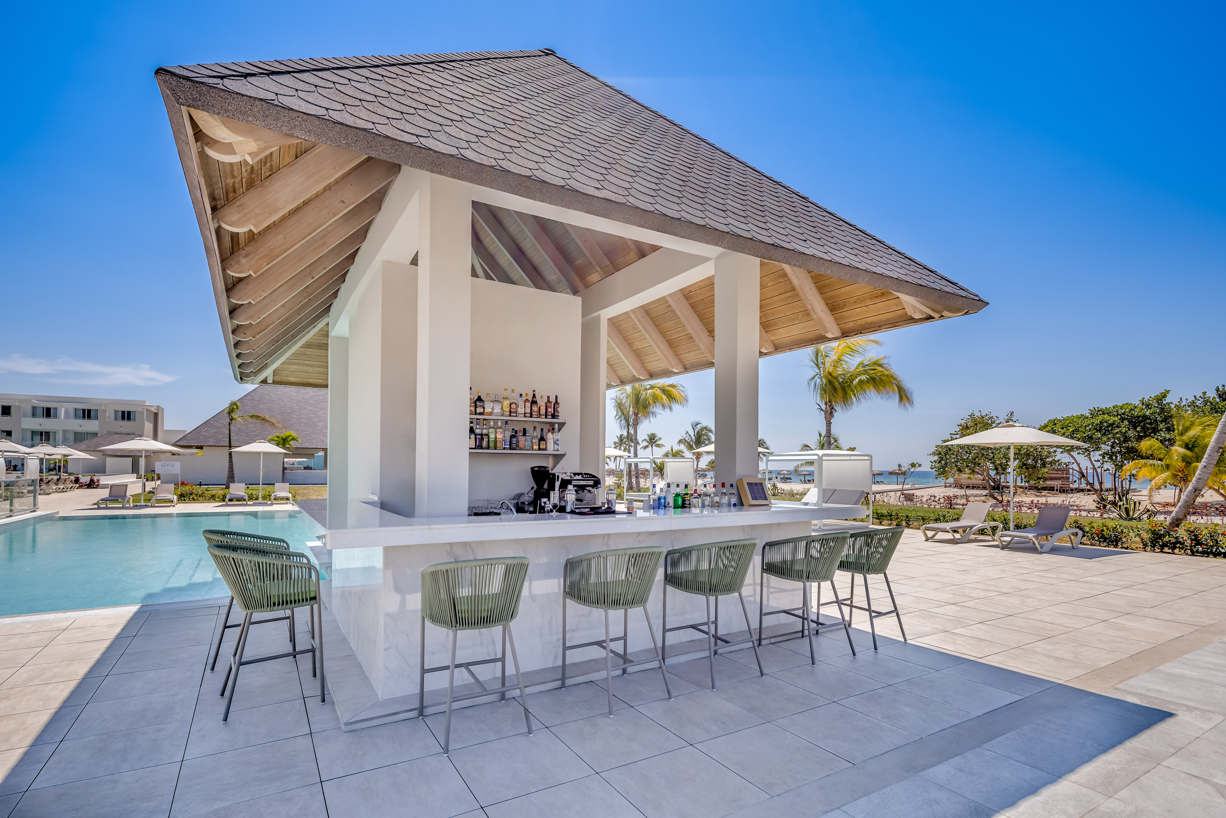 a bar with chairs around it