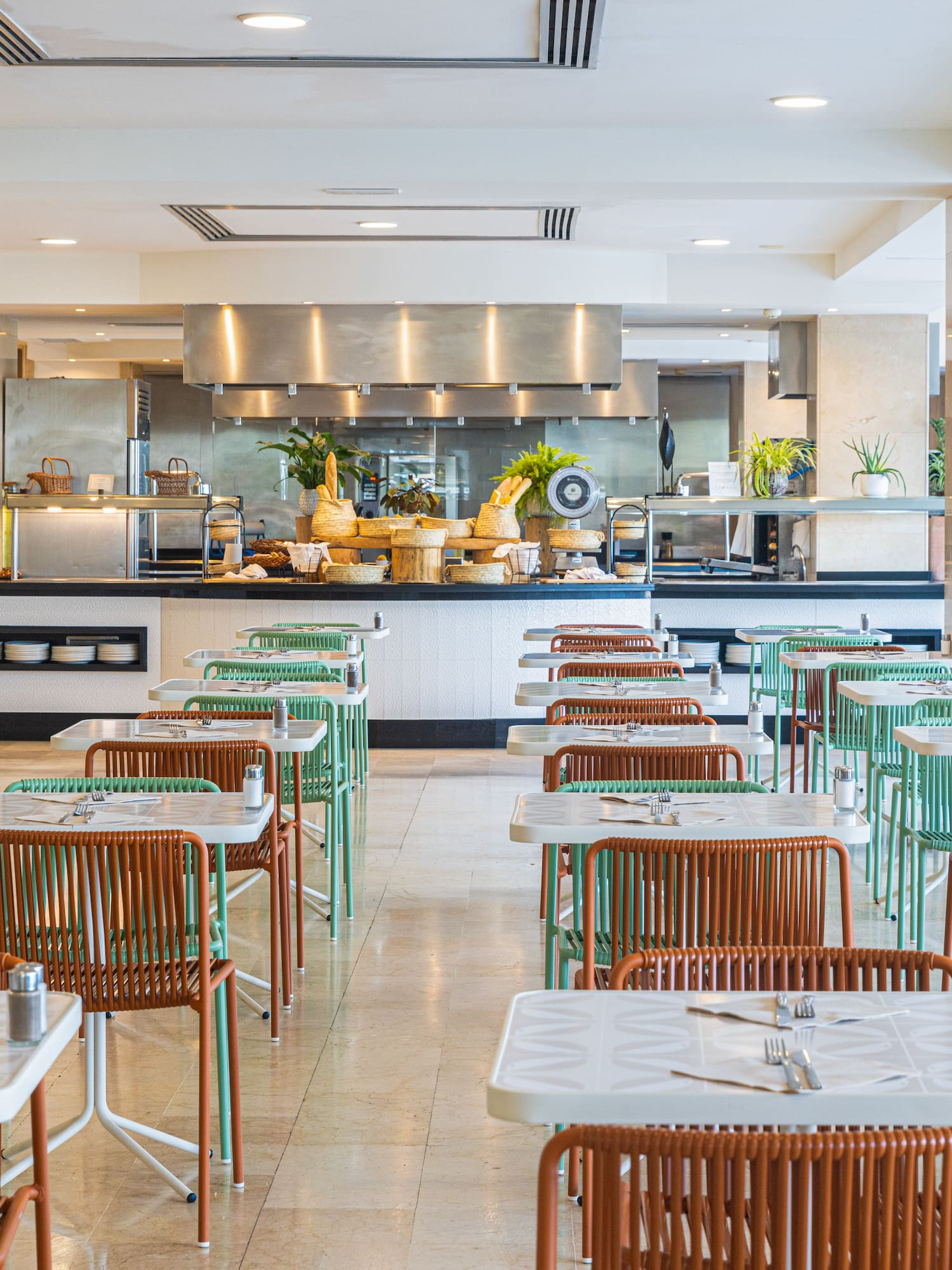 a restaurant with tables and chairs
