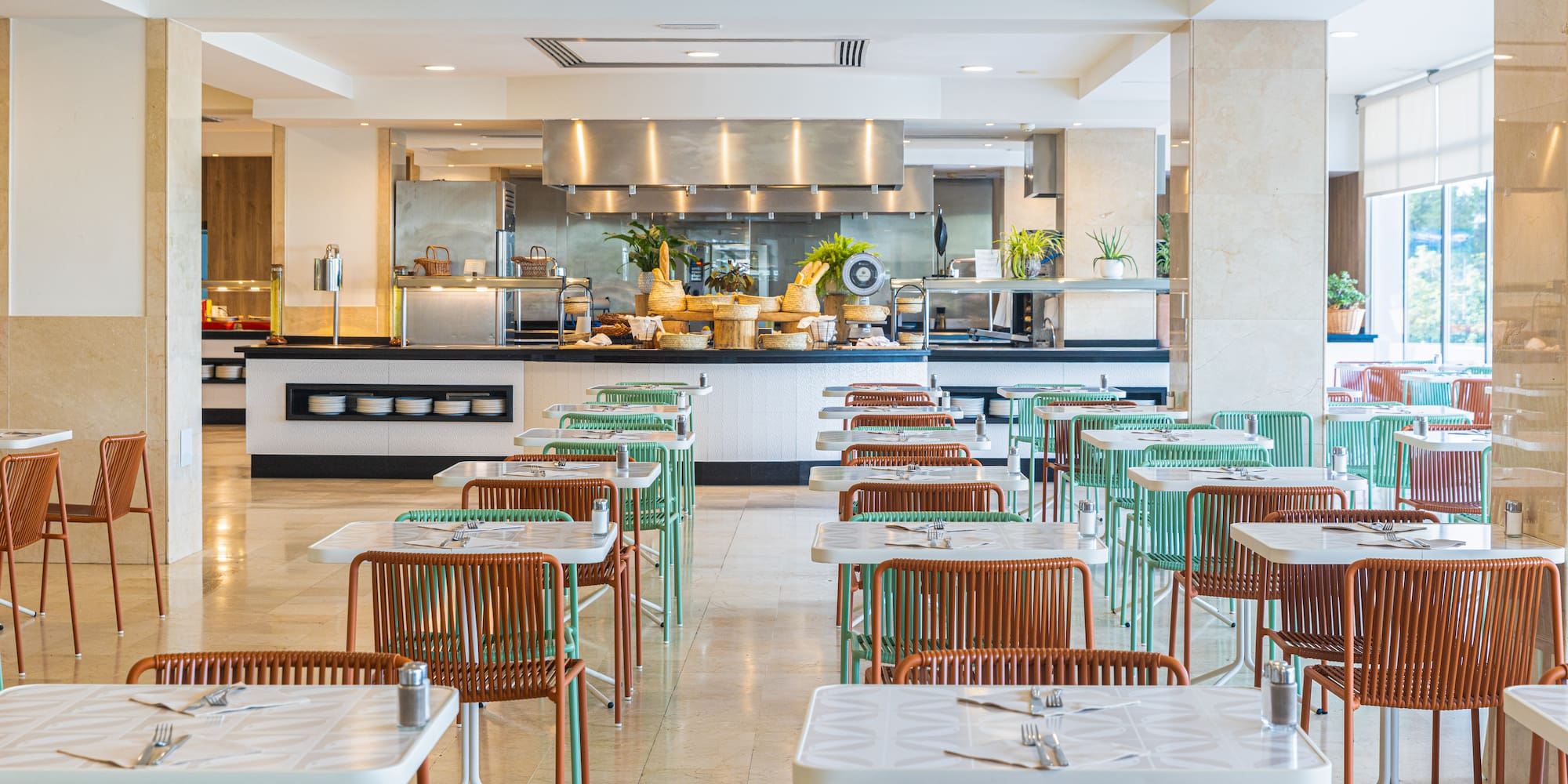 a restaurant with tables and chairs