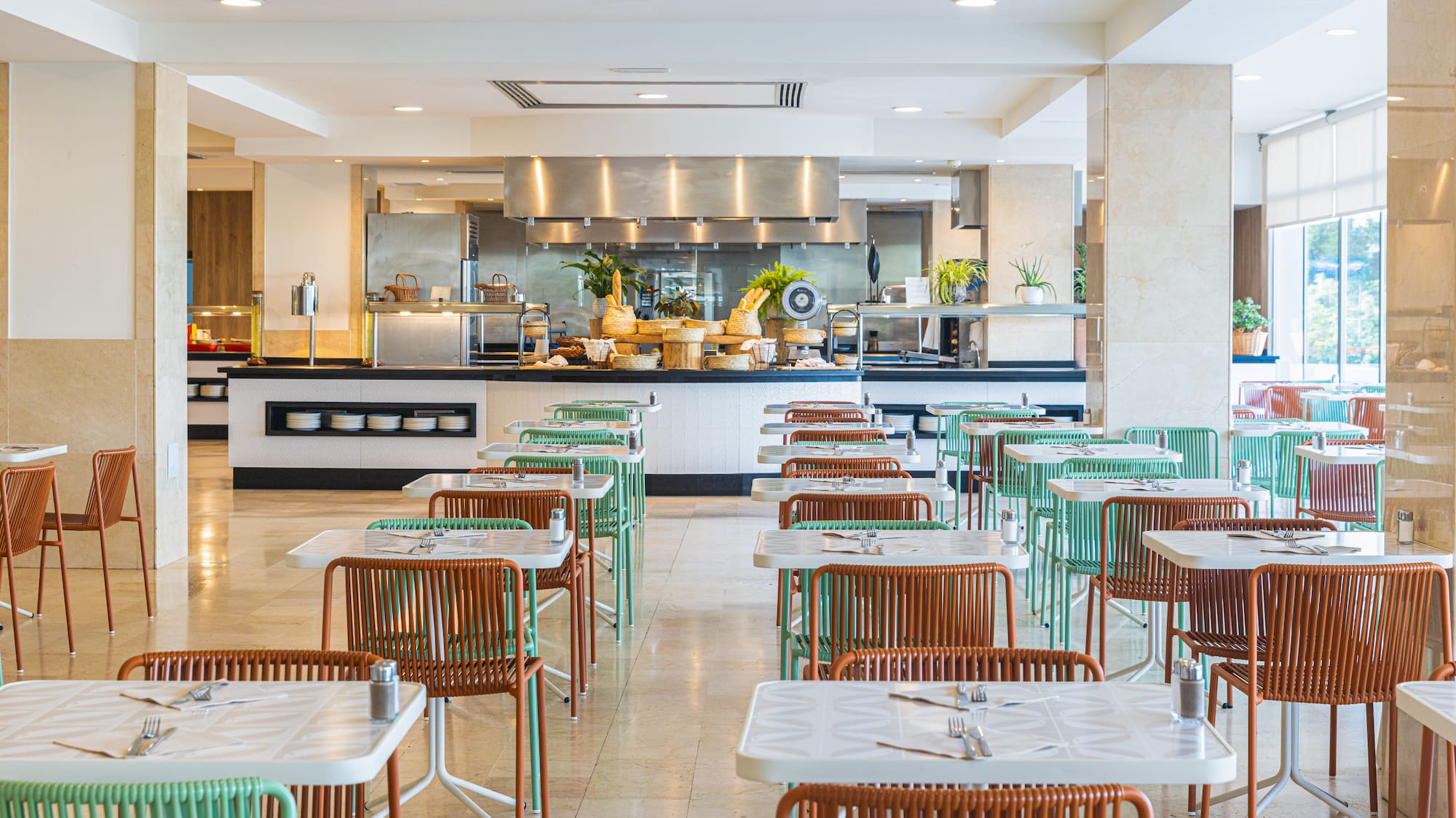 a restaurant with tables and chairs