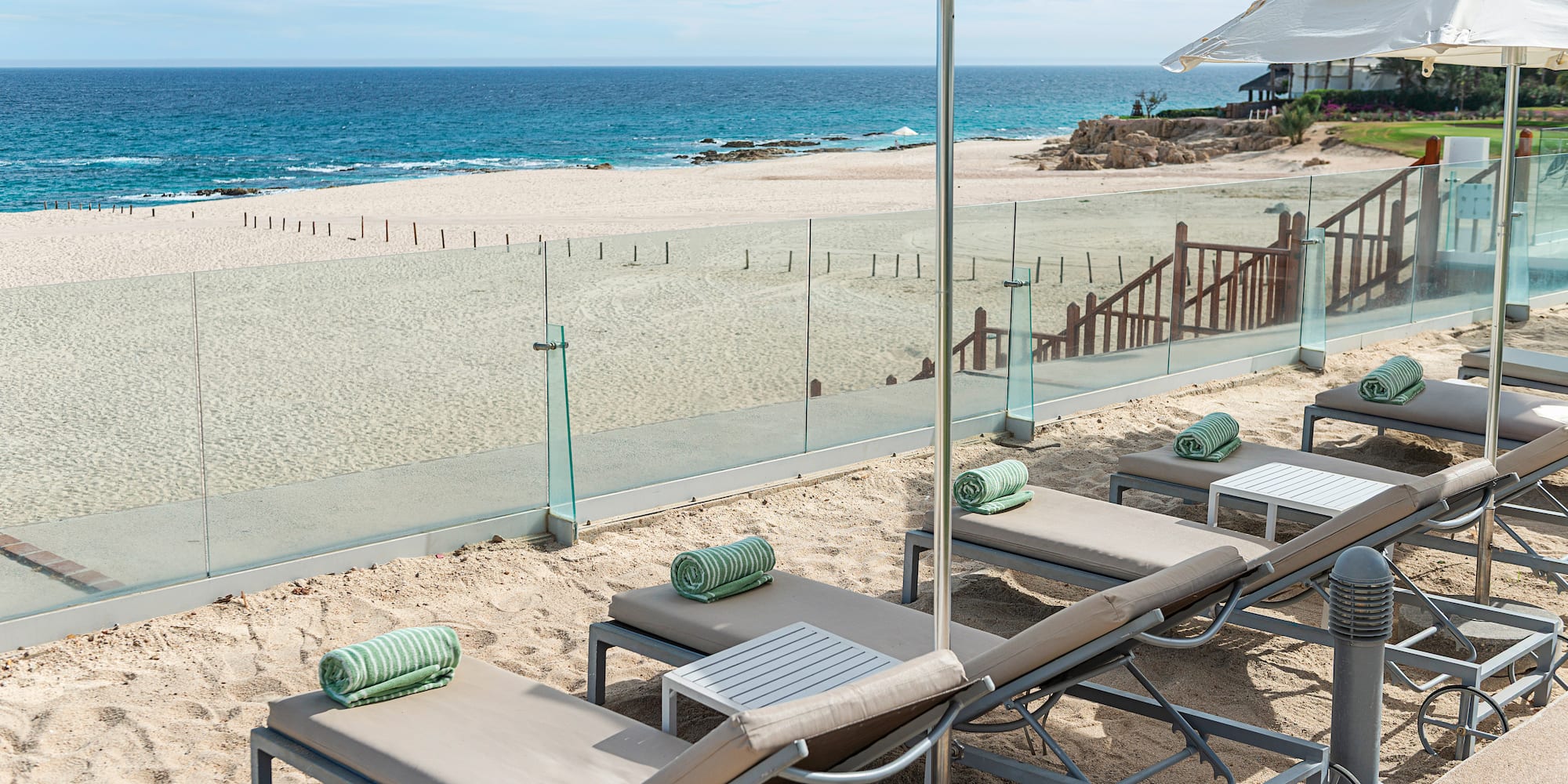 a woman in a swimsuit on a beach