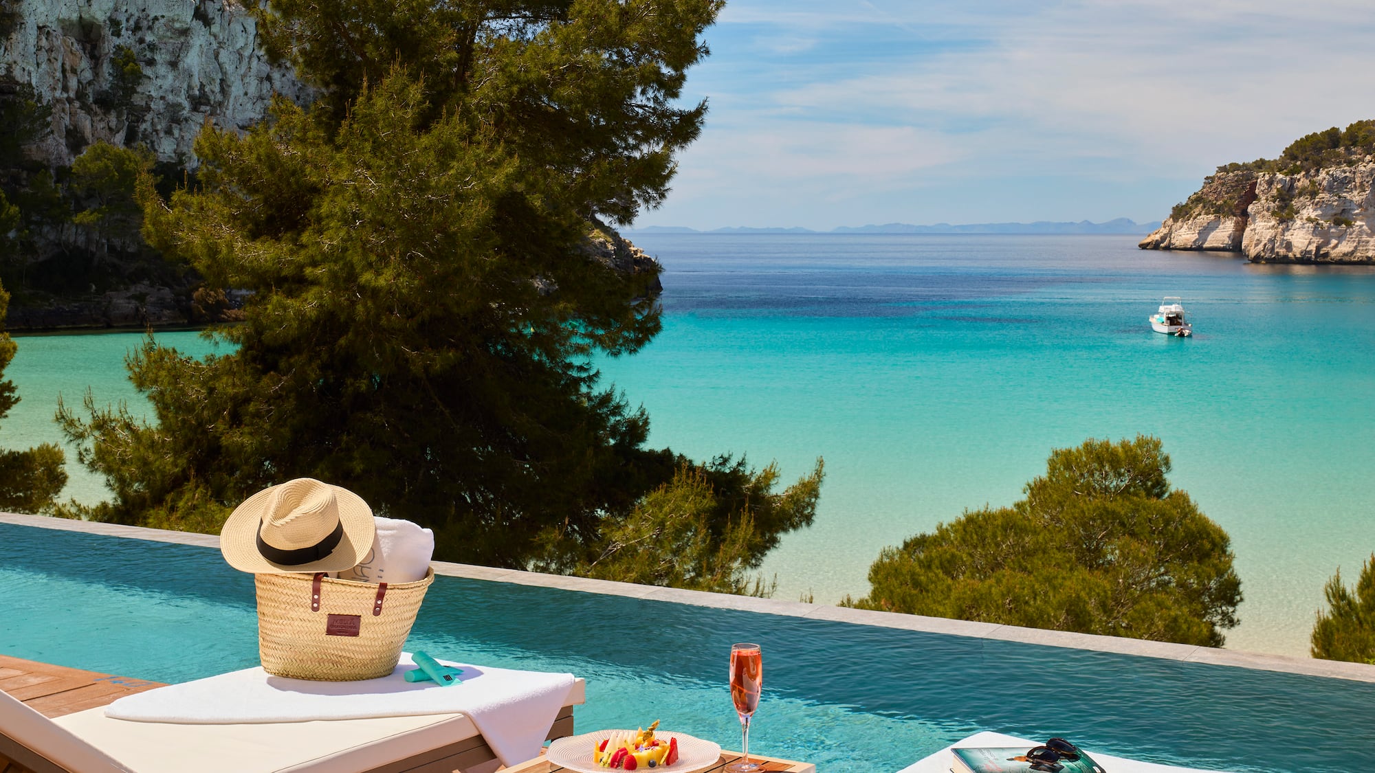 a pool with a table and a hat on it