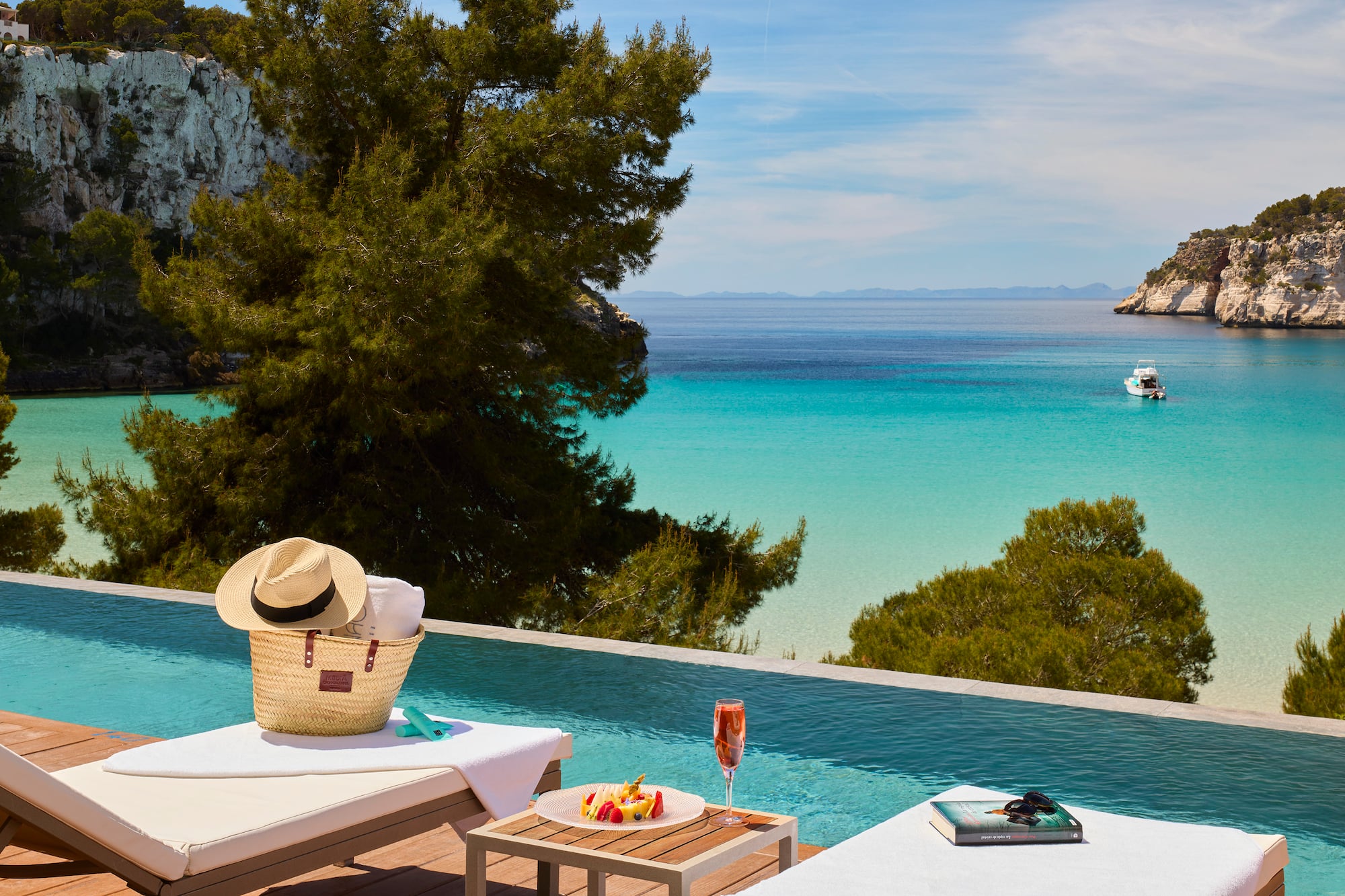 a pool with a table and a hat on it