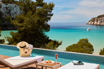 a pool with a table and a hat on it