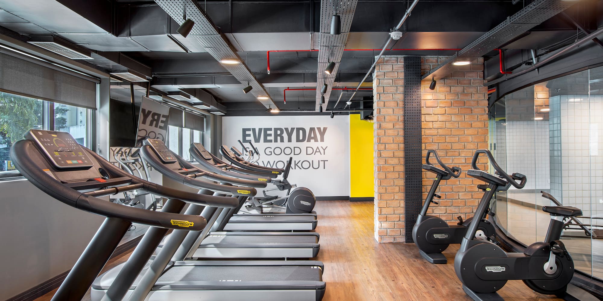a room with treadmills and exercise machines