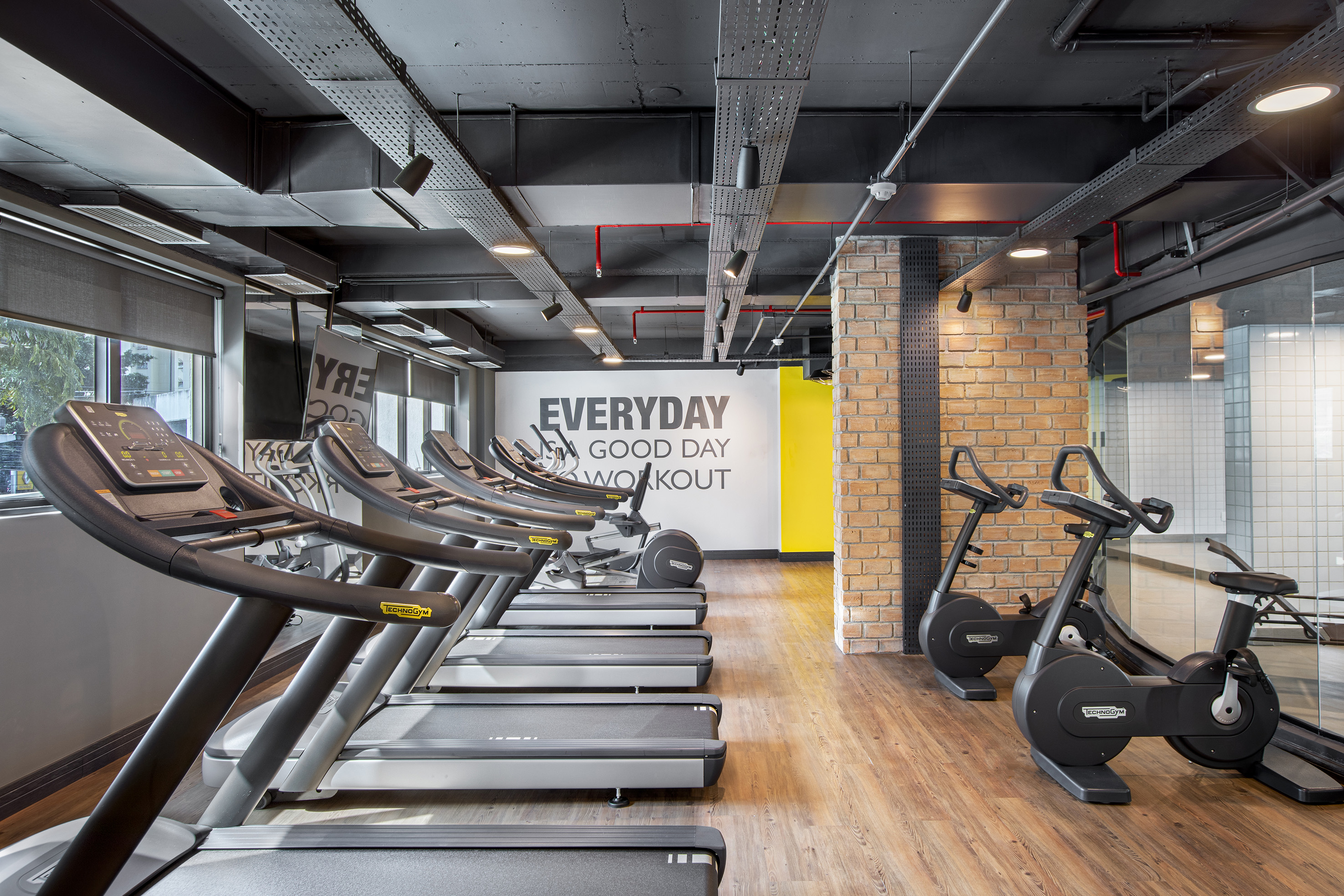 a room with treadmills and exercise machines