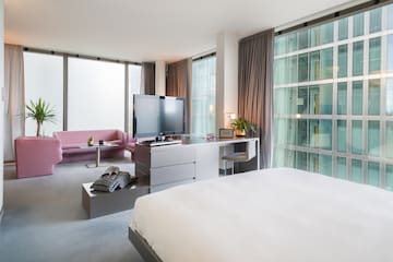 a room with a bed and a couch