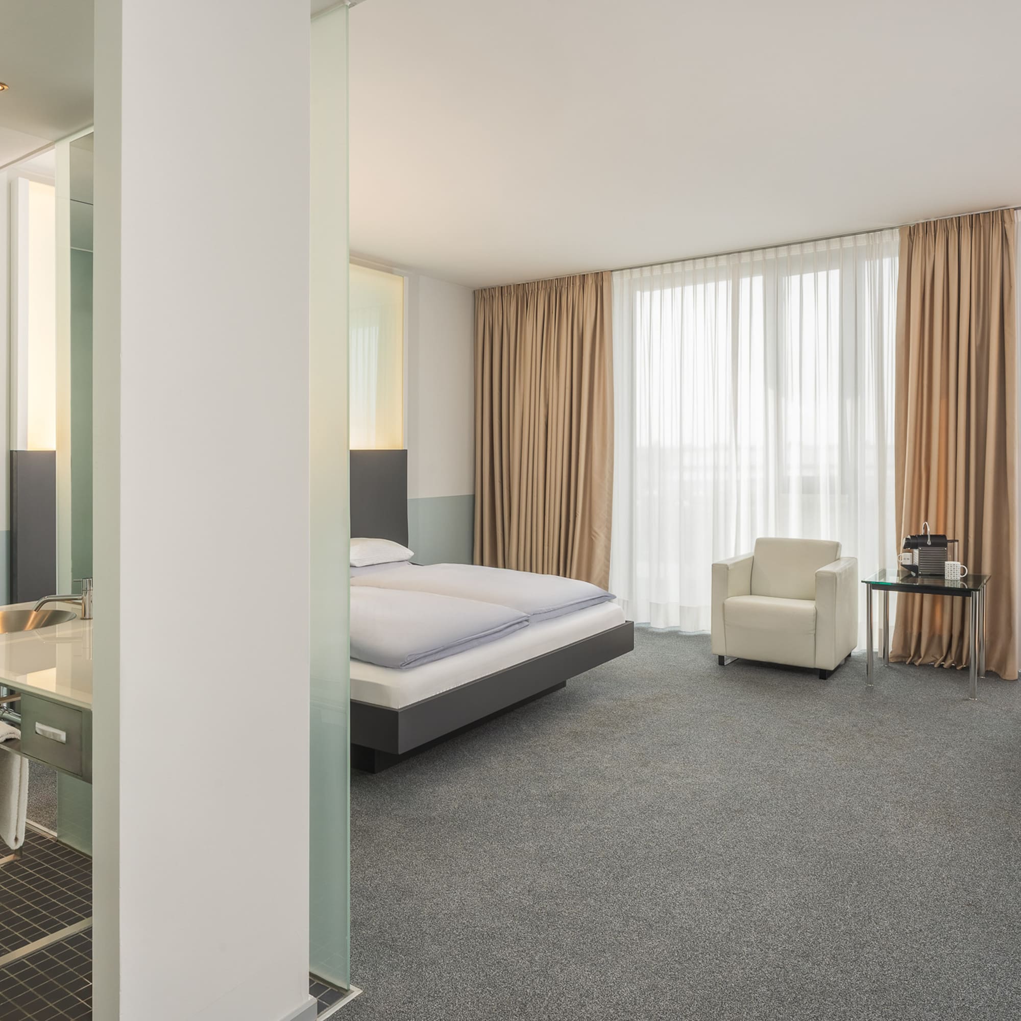 a room with a bed and a desk