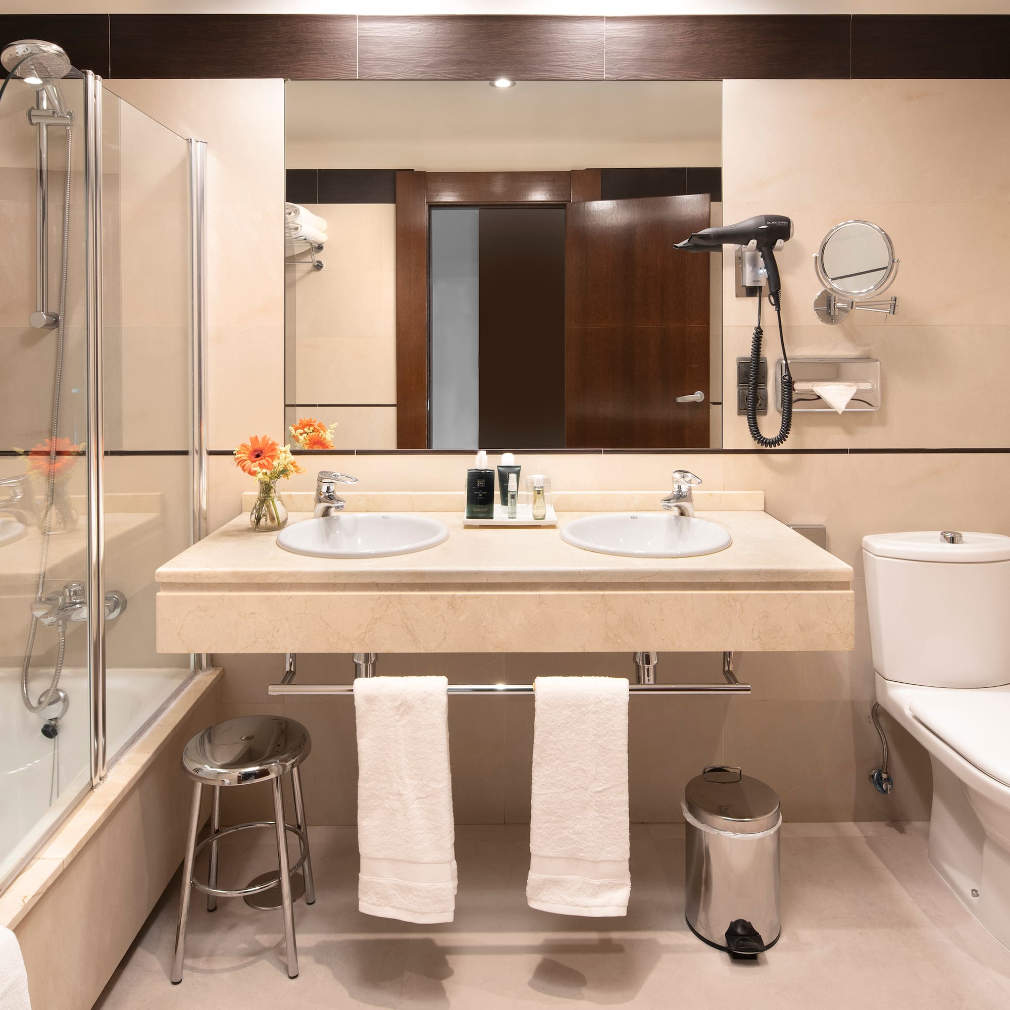 a bathroom with a shower and sink