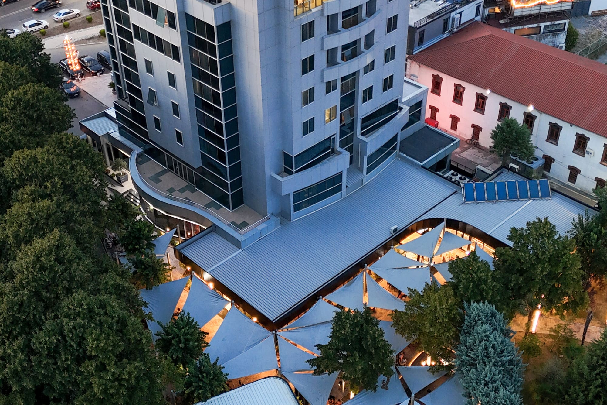 Aerial view: Grand Hotel Europa by Melia, modern building, unique outdoor shaded area.