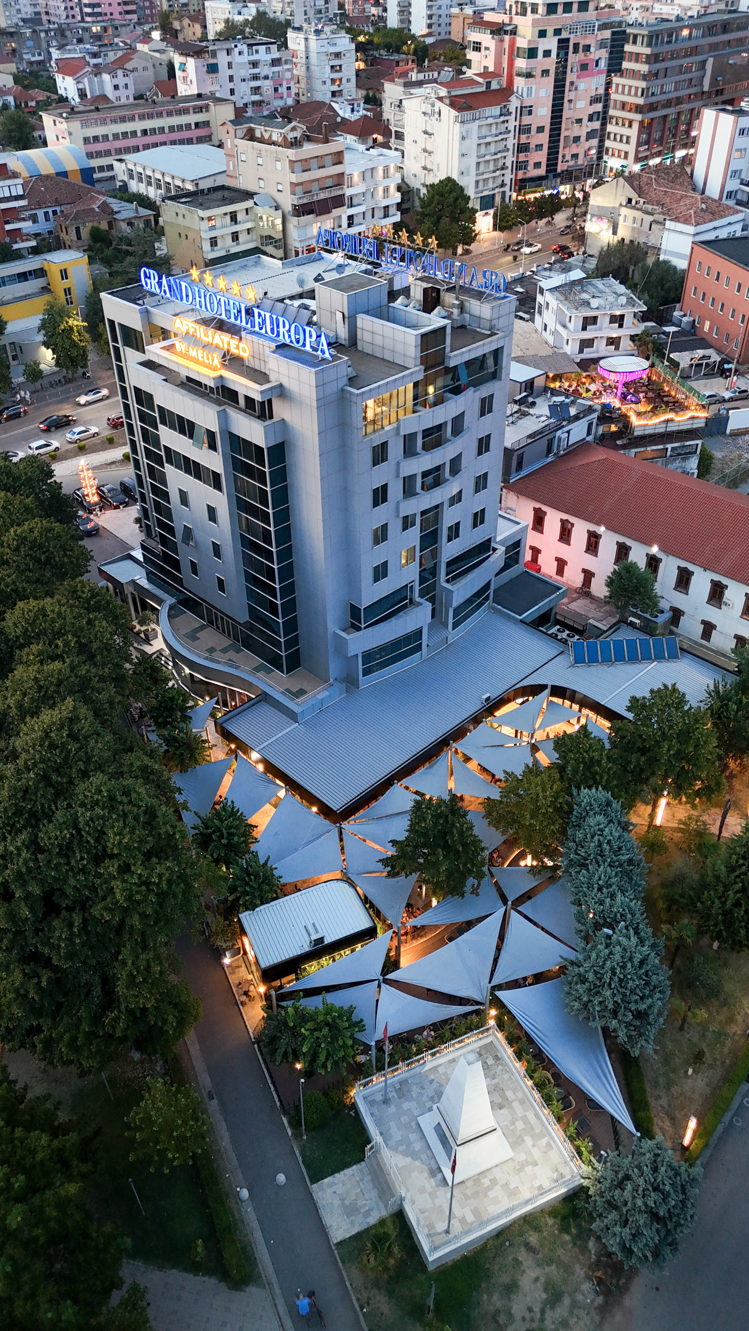 Aerial view: Grand Hotel Europa by Melia, modern building, unique outdoor shaded area.