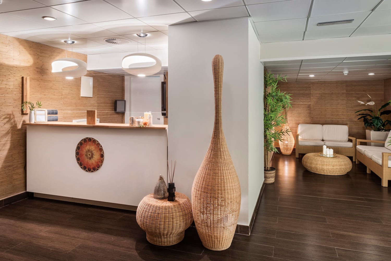 a pool with chairs and a large window