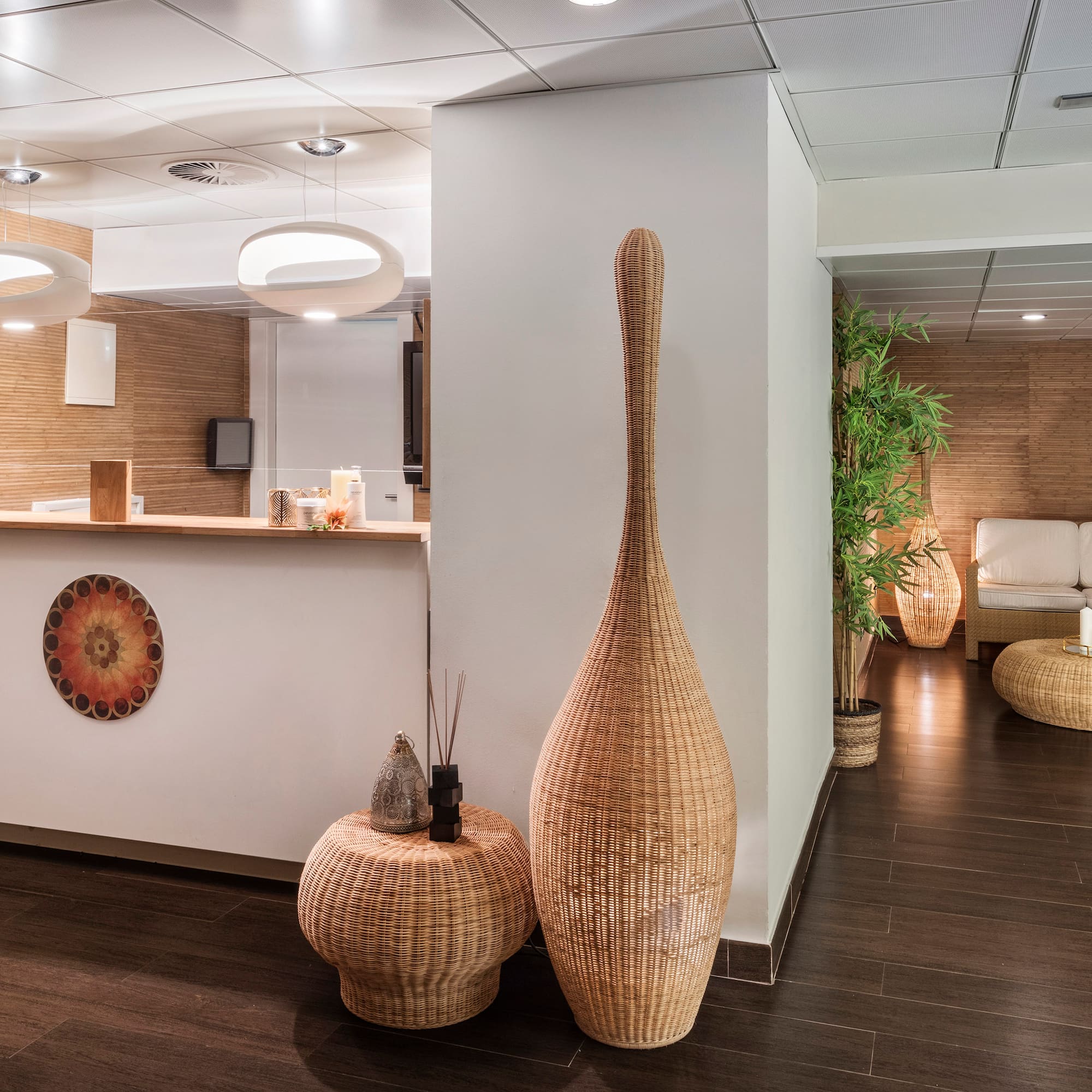 a room with a white wall and a white wall and a white couch