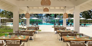 a restaurant with tables and chairs