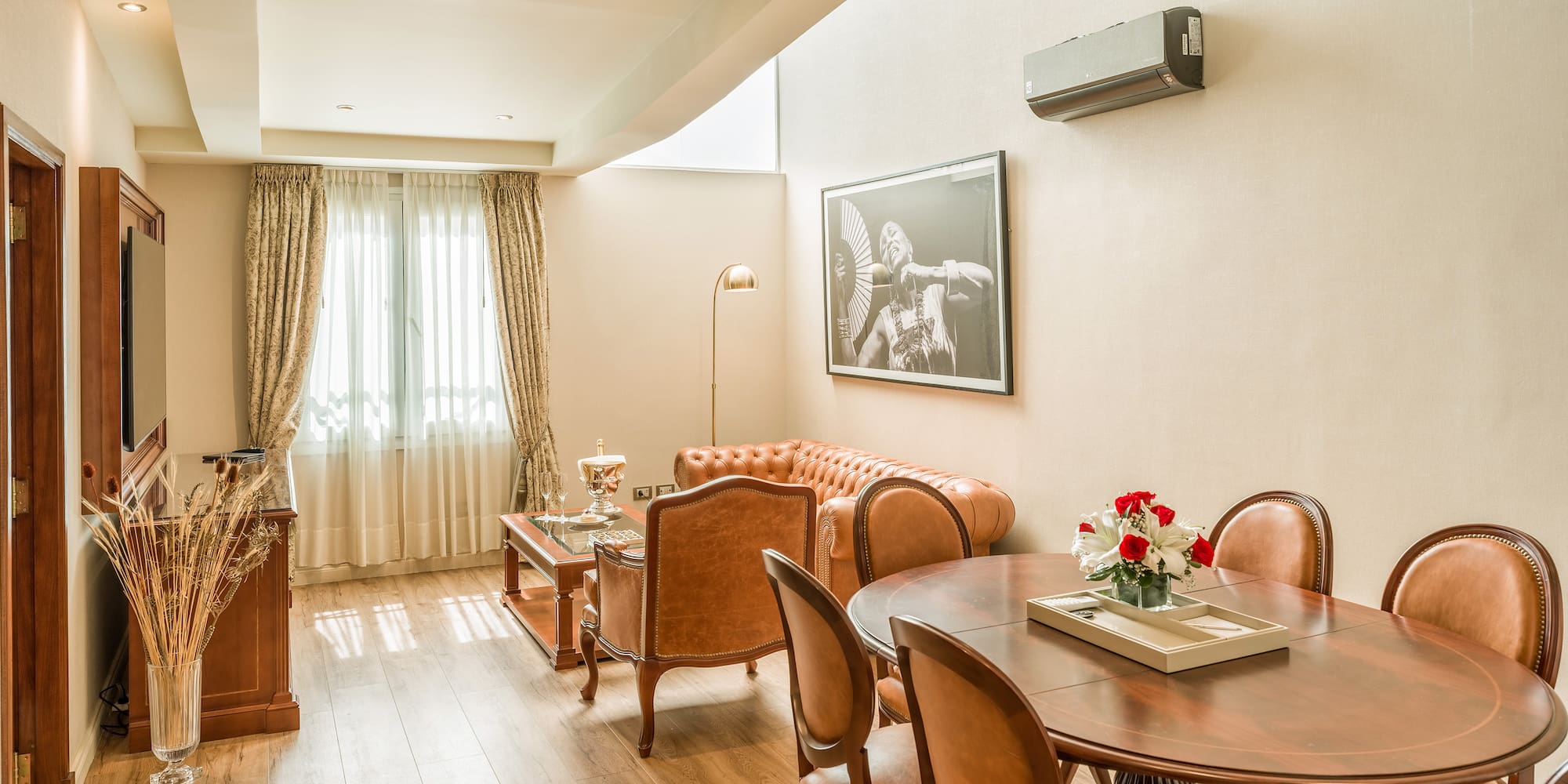 a room with a table and chairs