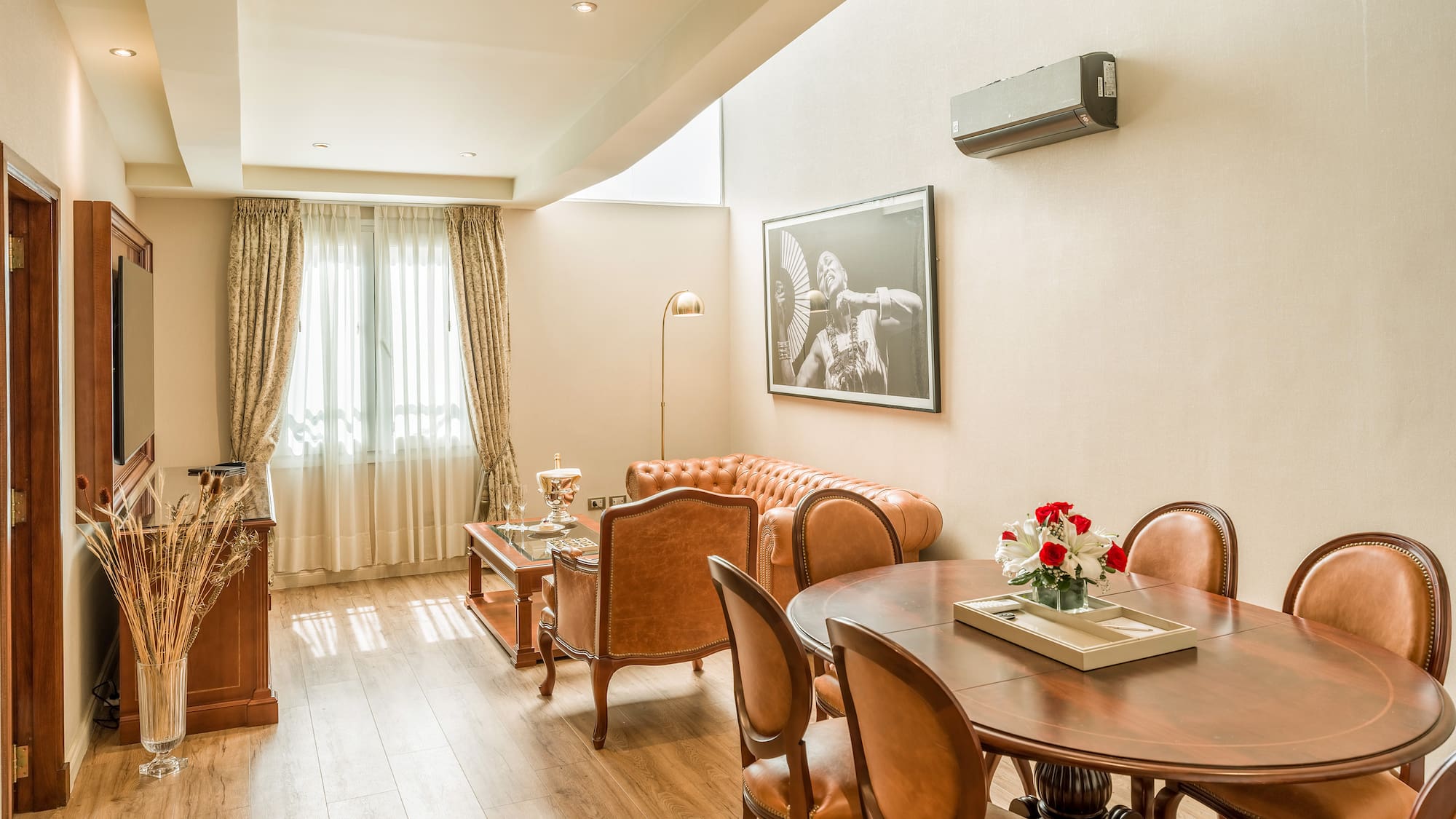 a room with a table and chairs