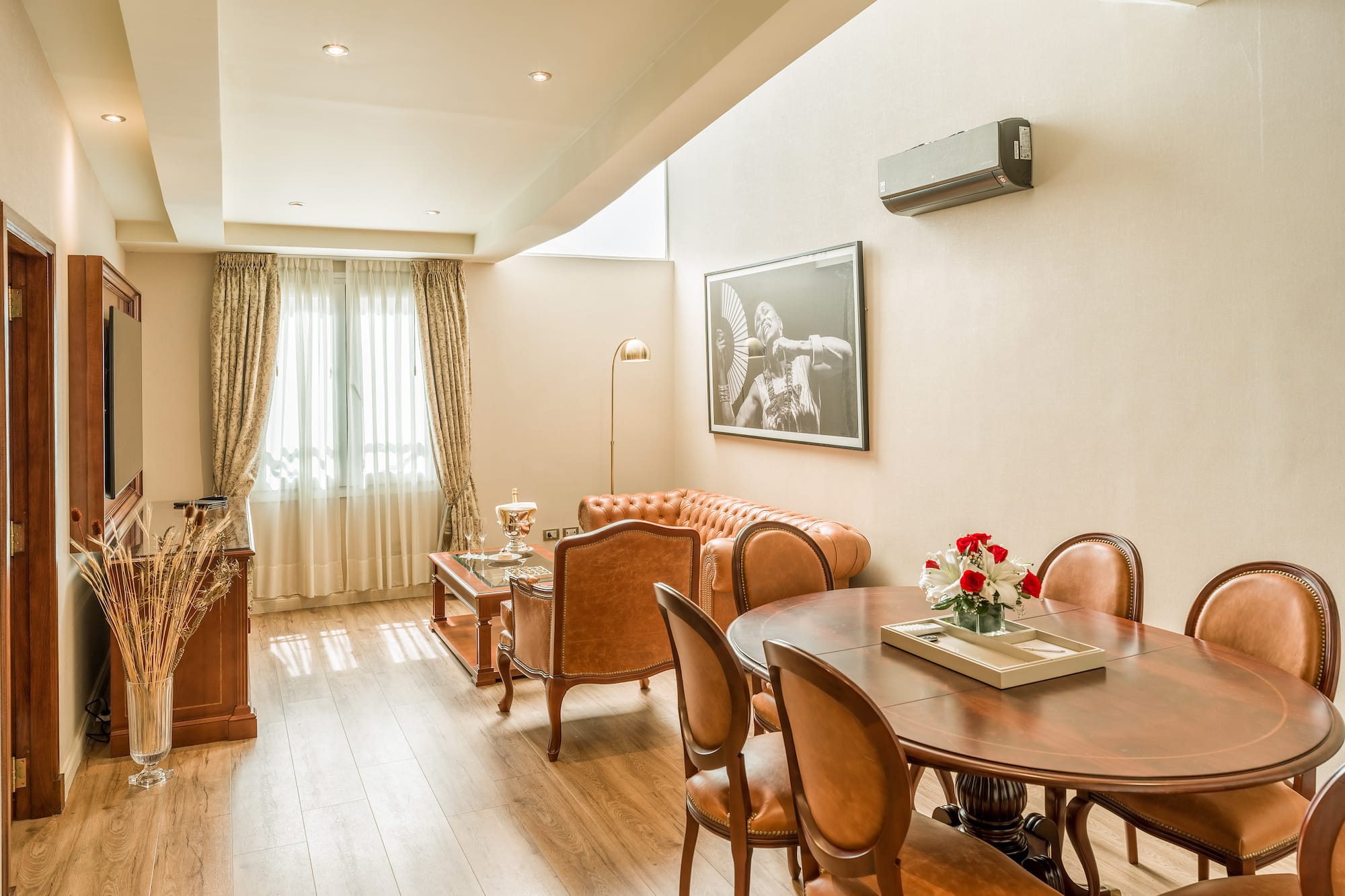 a room with a table and chairs