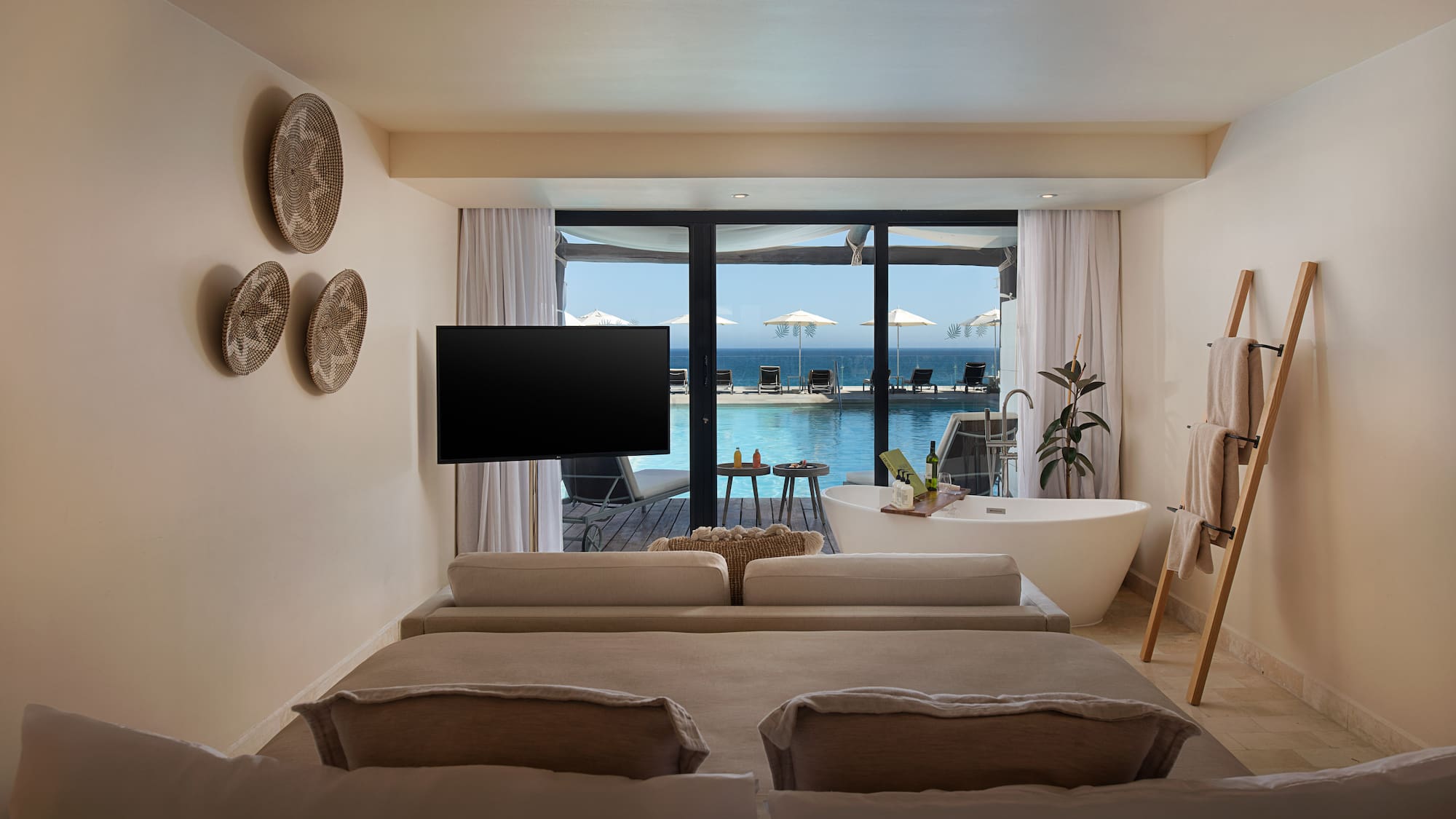 a room with a television and a tub