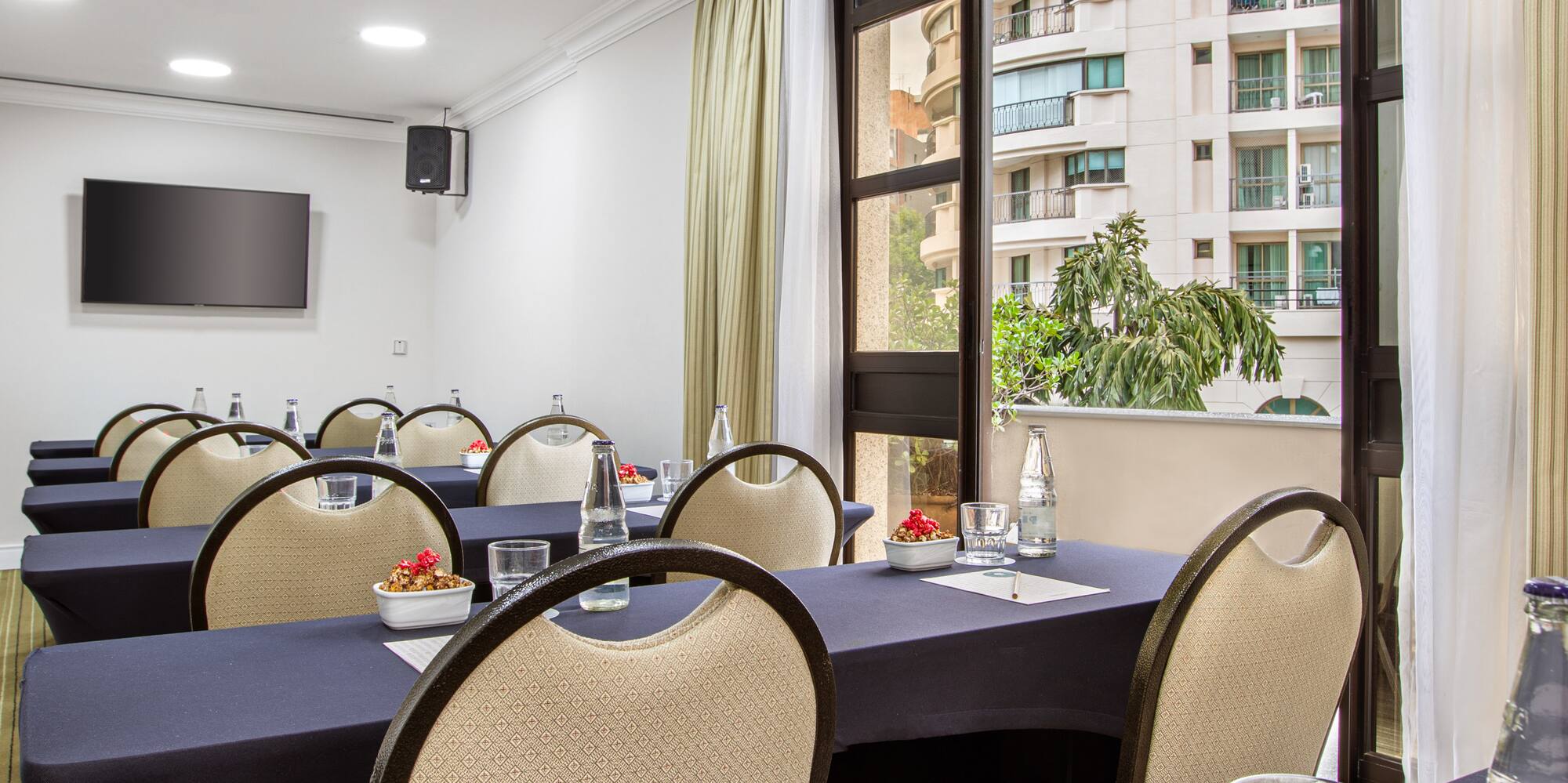 a room with tables and chairs