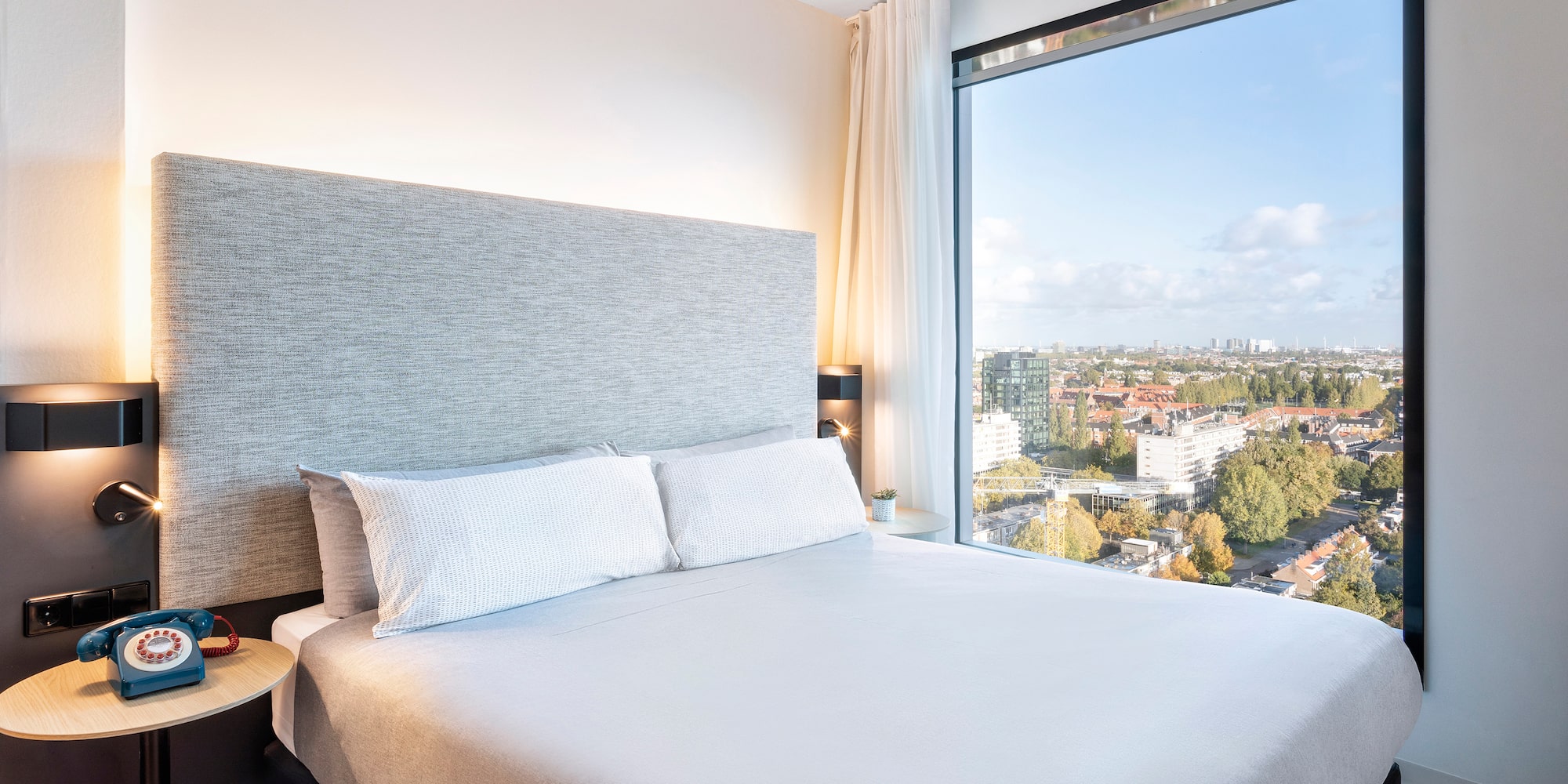 a bed with a large window