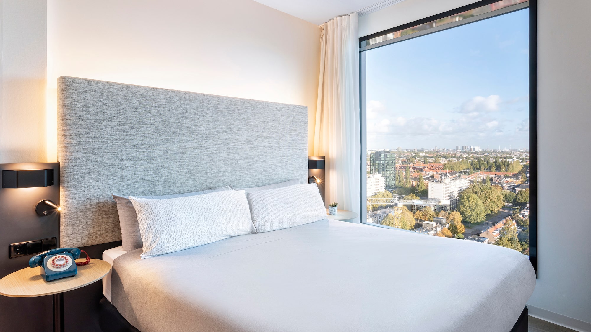 a bed with a large window