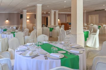 a room with tables and chairs