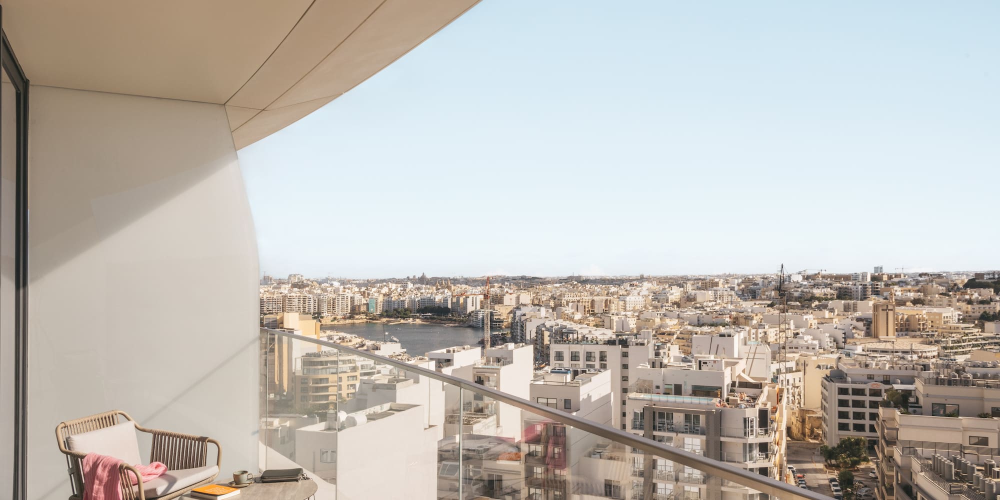 a balcony overlooking a city