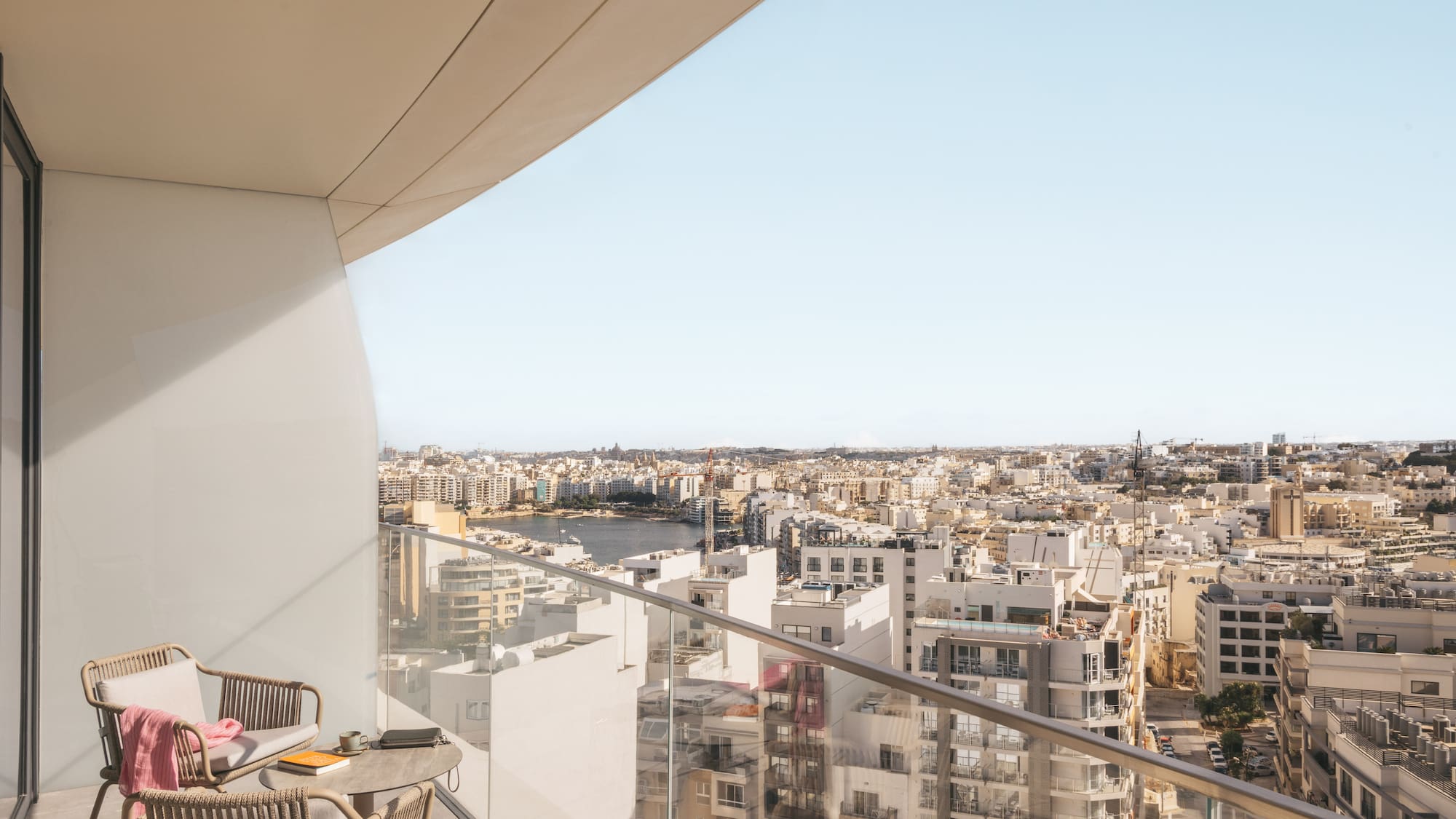 a balcony overlooking a city