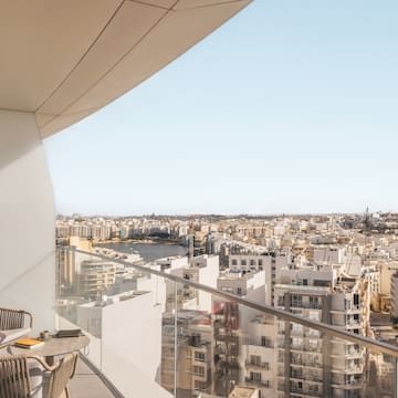 a balcony overlooking a city