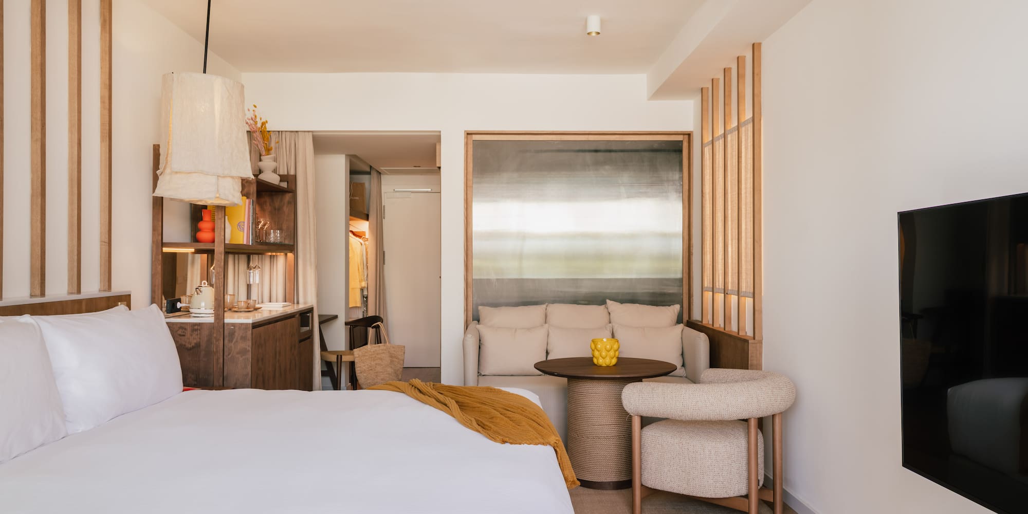 a room with a bed and a table