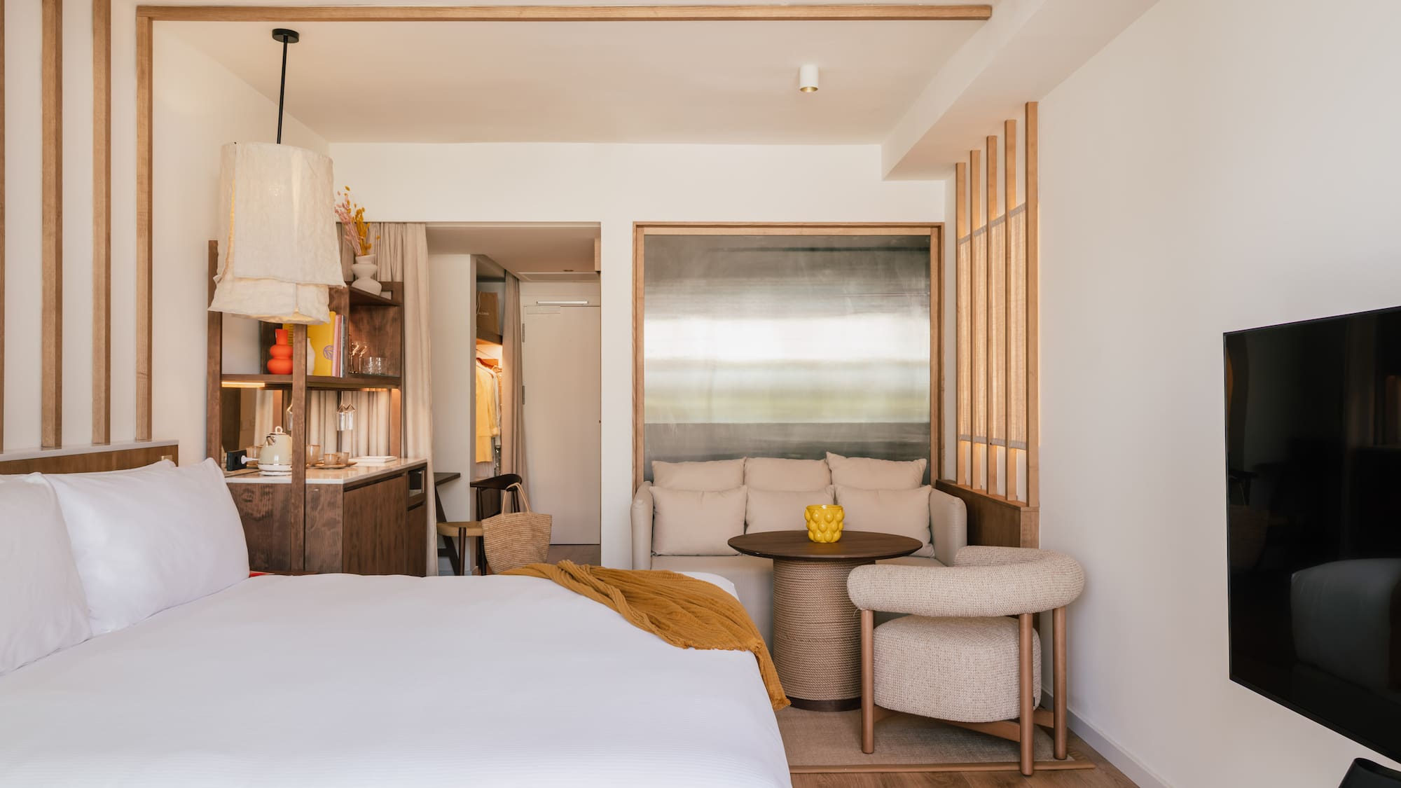 a room with a bed and a table