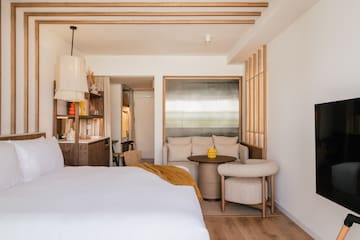 a room with a bed and a table