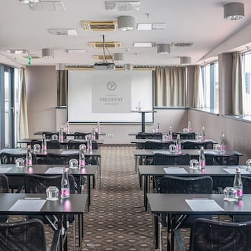 a room with tables and chairs