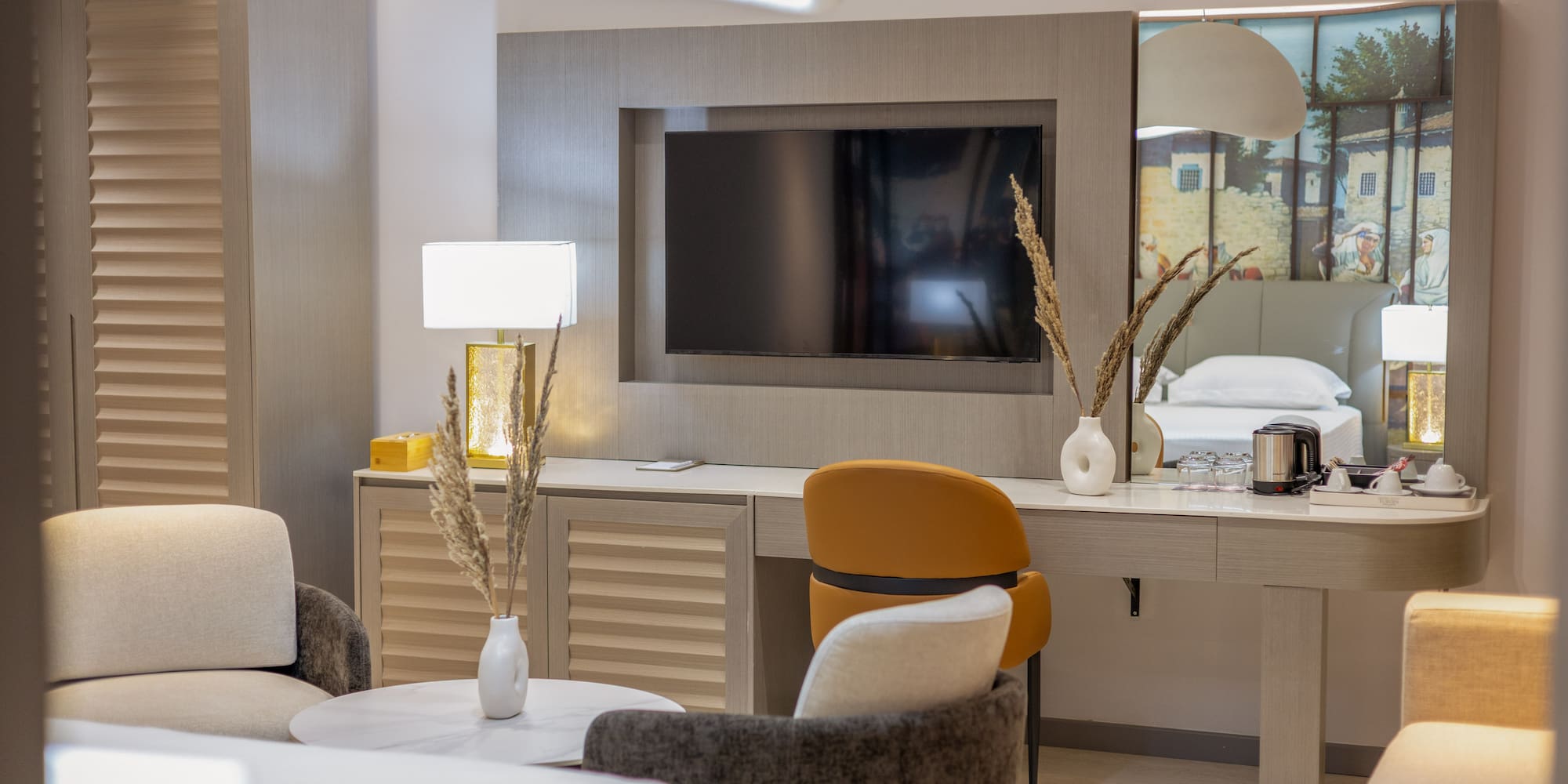 a room with a television and a bed