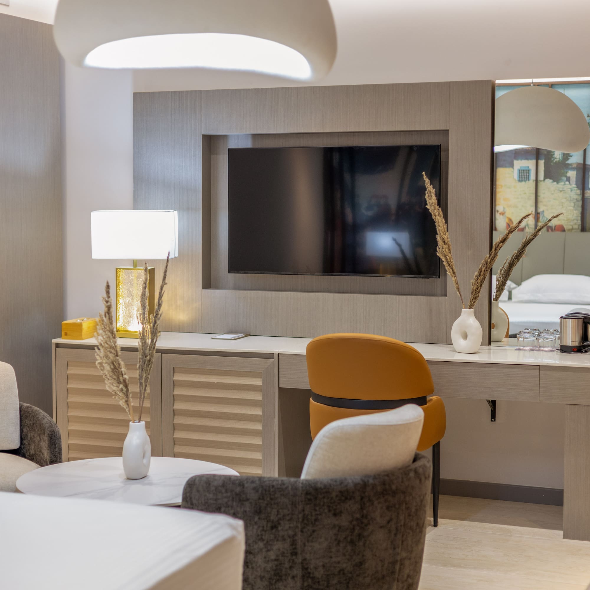 a room with a television and a bed