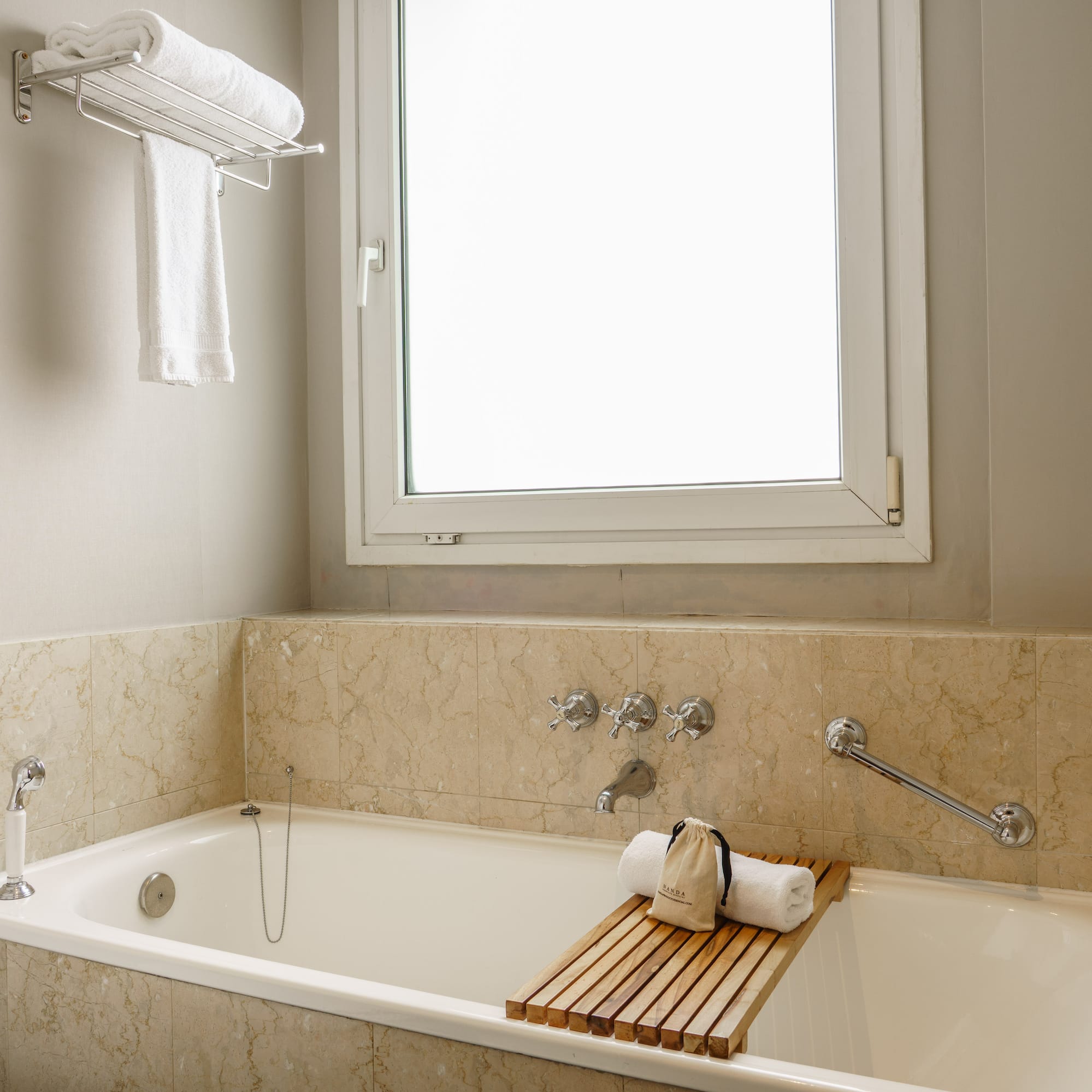 a bathtub with a towel on it