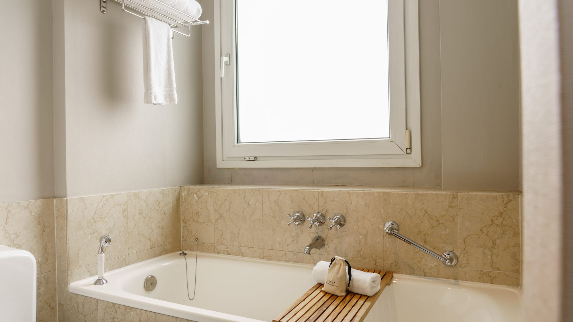 a bathtub with a towel on it