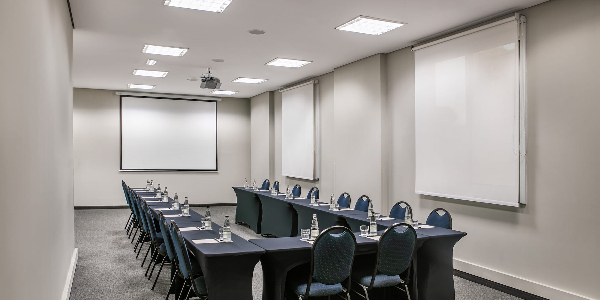a room with tables and chairs