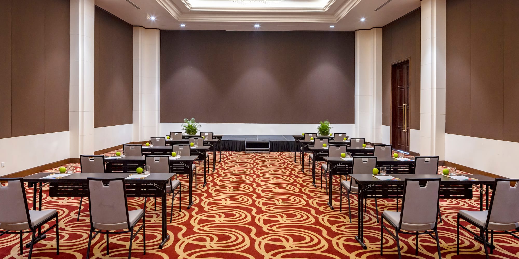 a room with tables and chairs