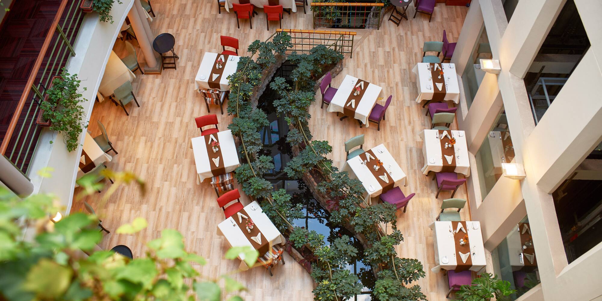 a restaurant with tables and chairs
