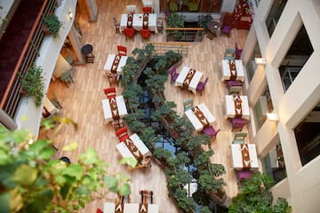a restaurant with tables and chairs