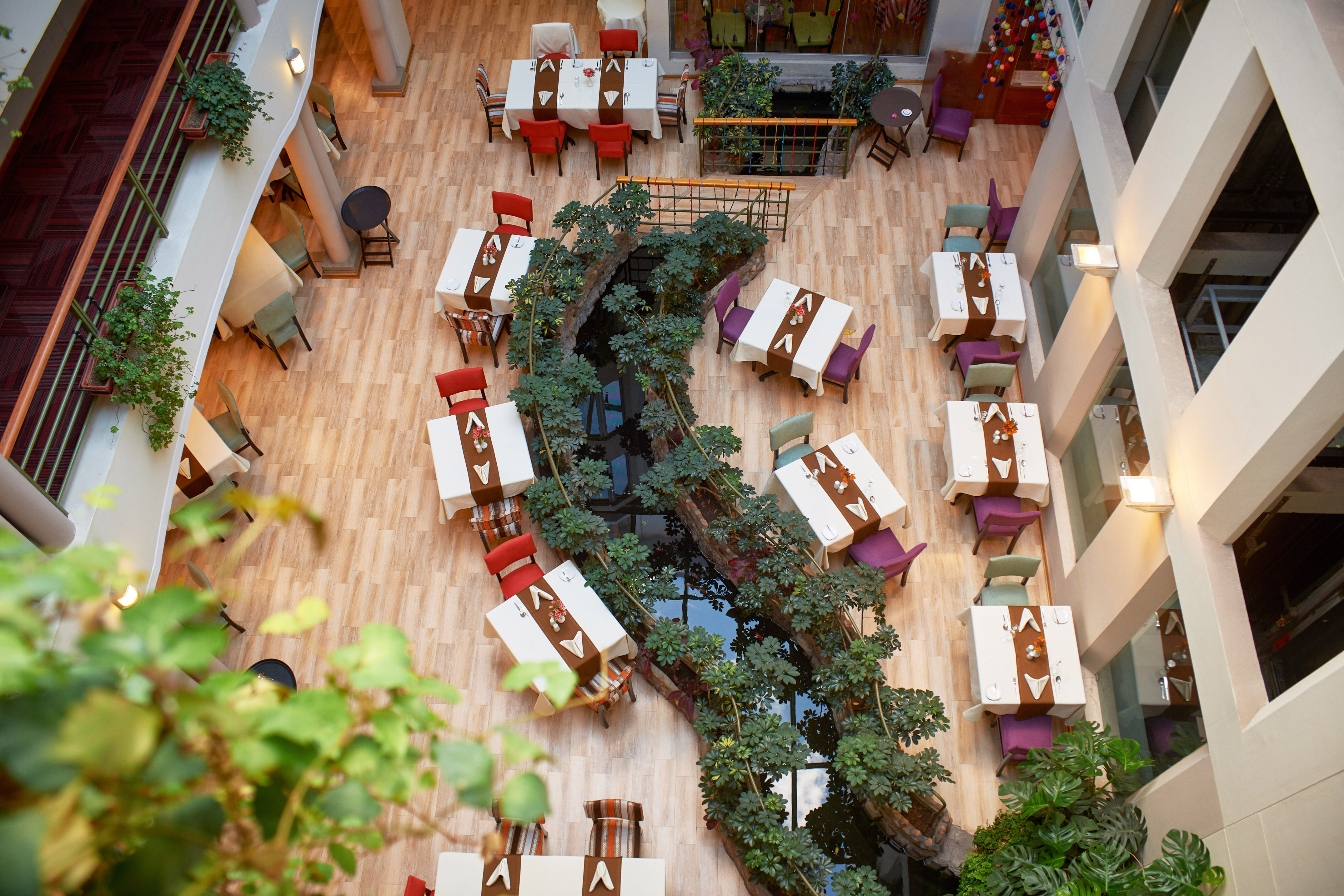 a restaurant with tables and chairs