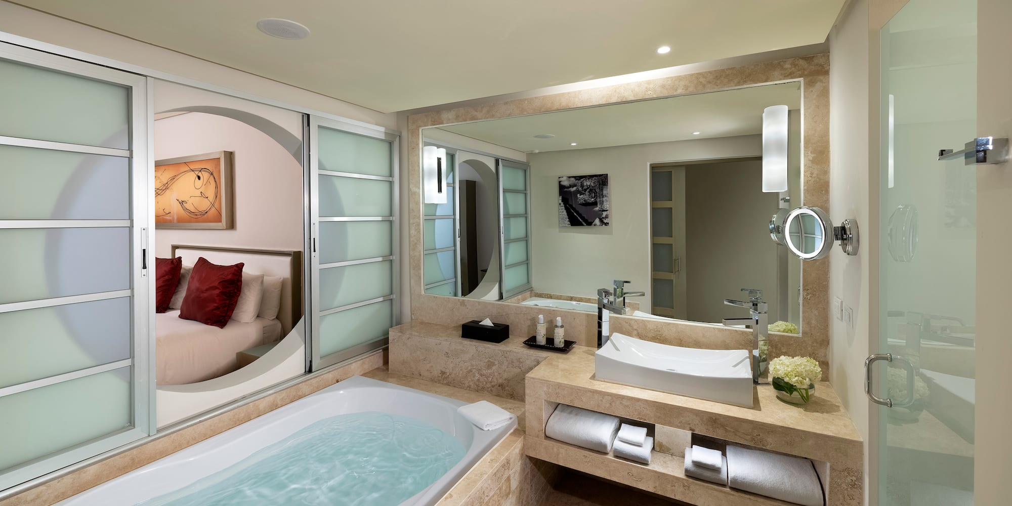 a bathroom with a bathtub and a mirror