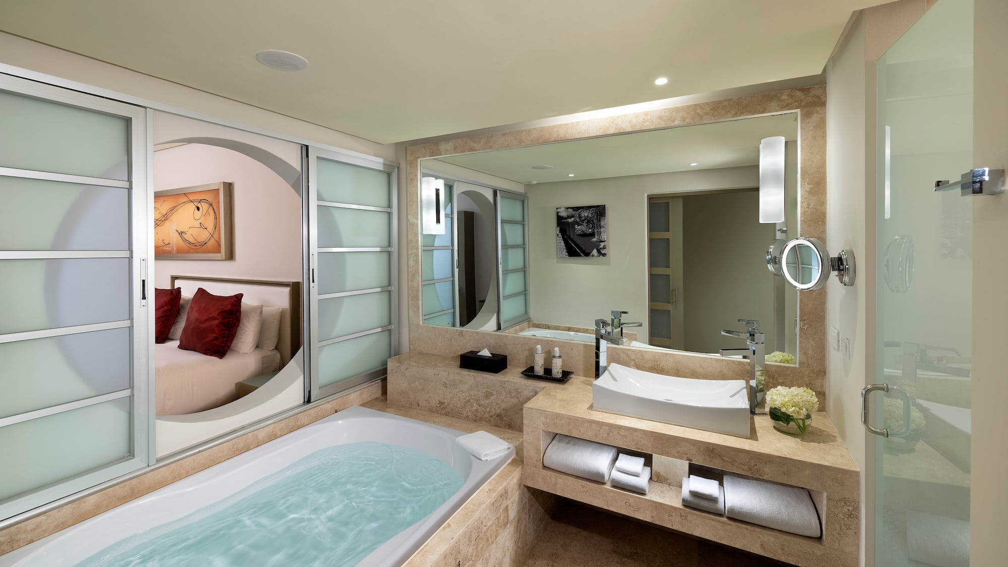 a bathroom with a bathtub and a mirror