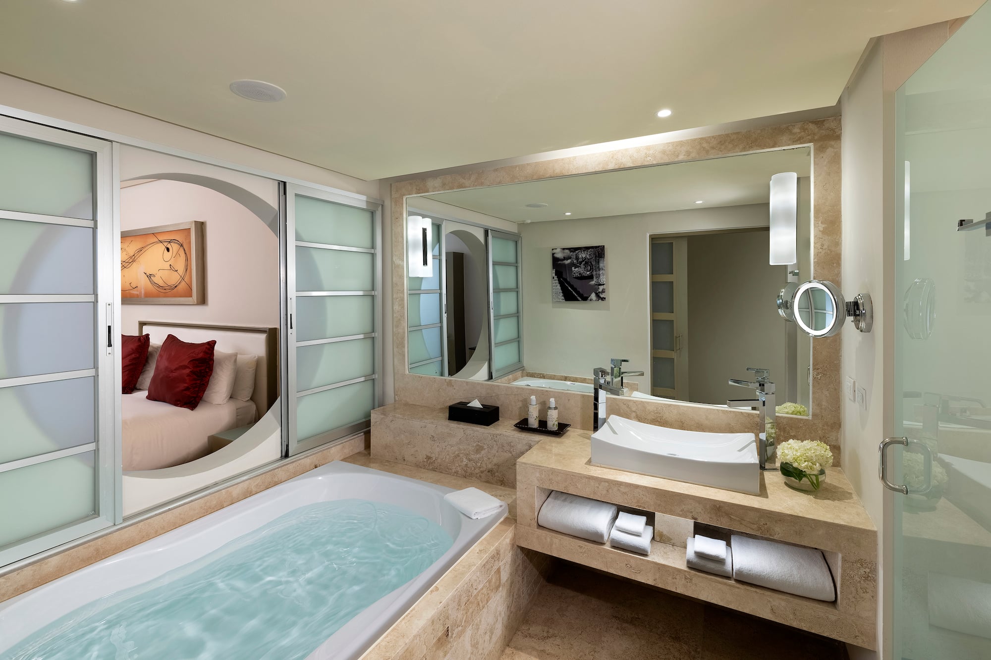 a bathroom with a bathtub and a mirror