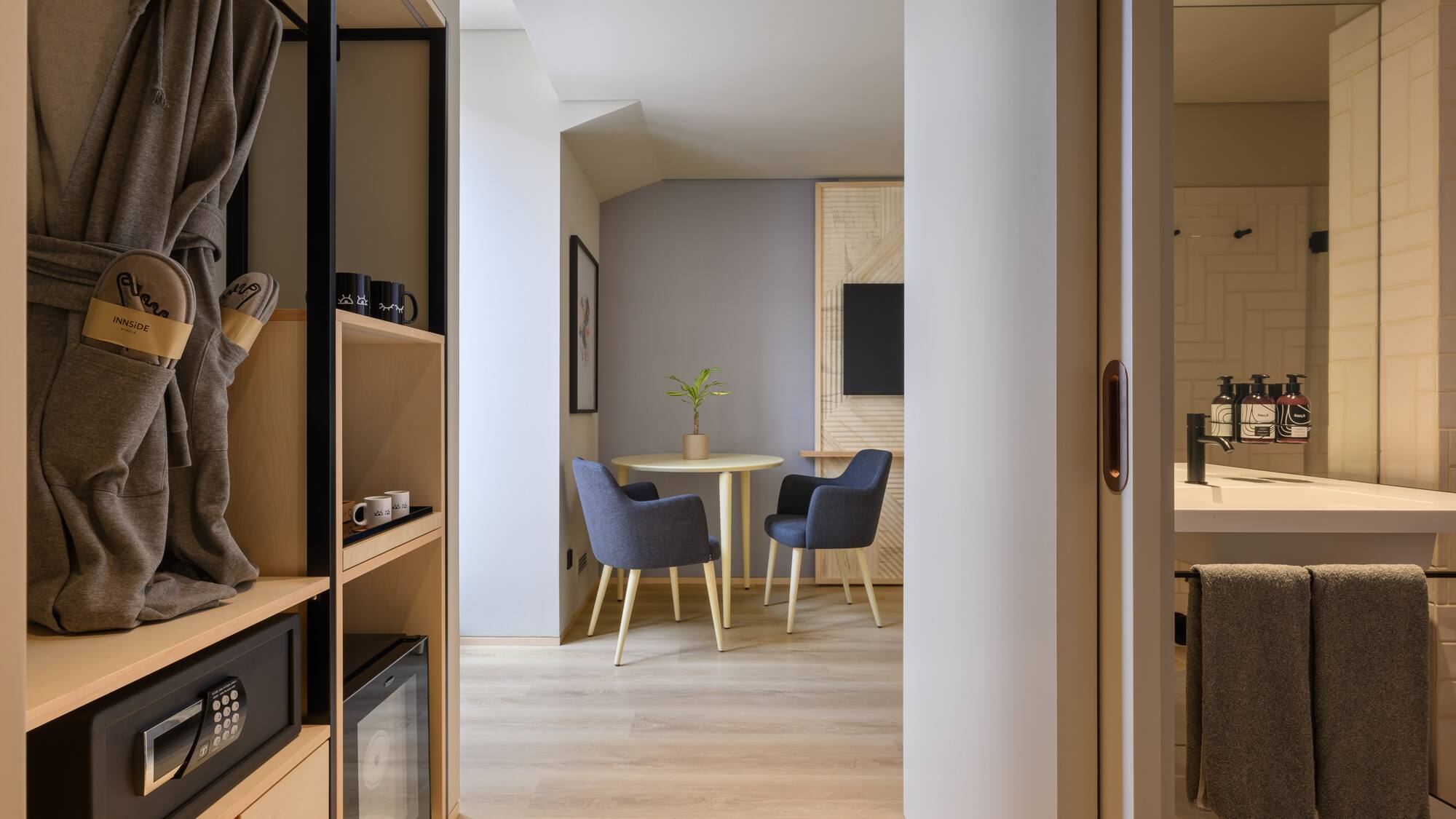 a room with a table and chairs
