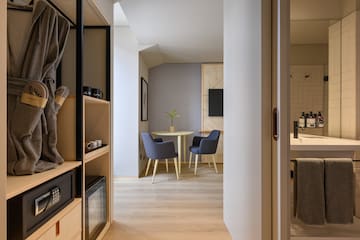 a room with a table and chairs